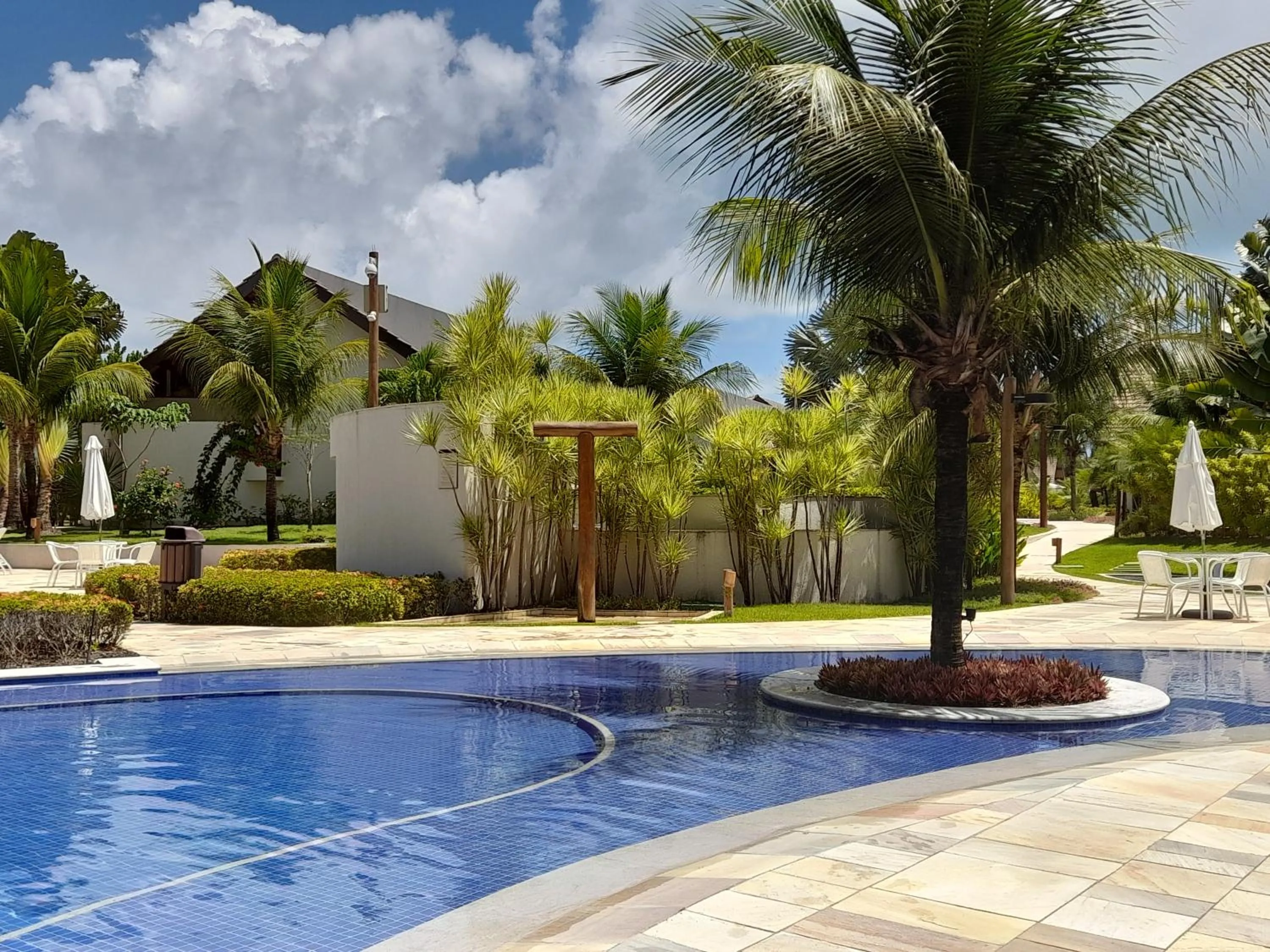 Swimming pool in Aconchegante Flat em condomínio na beira mar de Muro Alto - Malawi Beach Resort