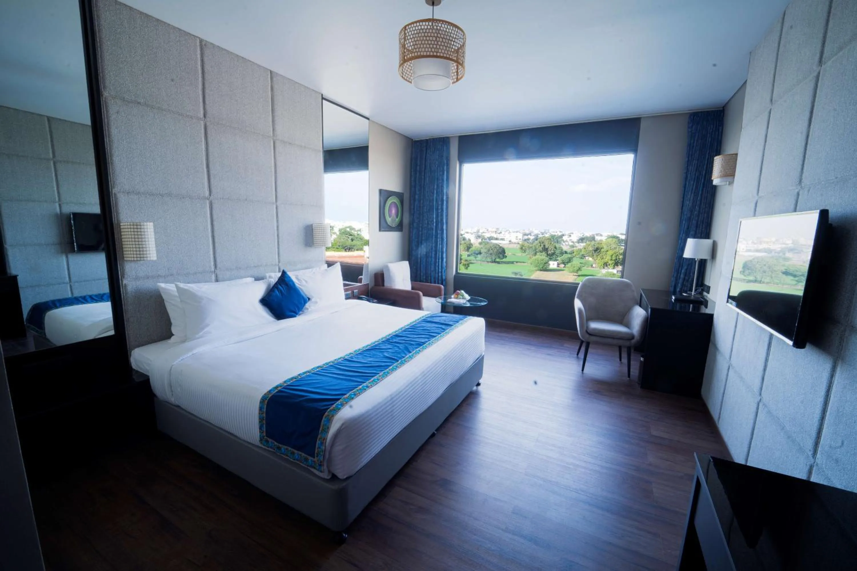 Photo of the whole room, Bed in Essentia Luxury Hotel Indore