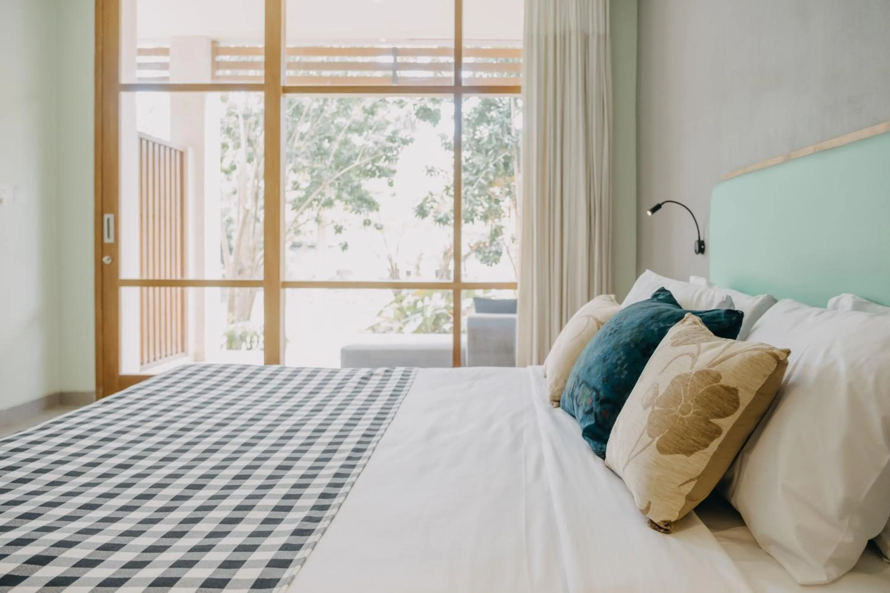 Bed in Wana Karsa Ubud Hotel