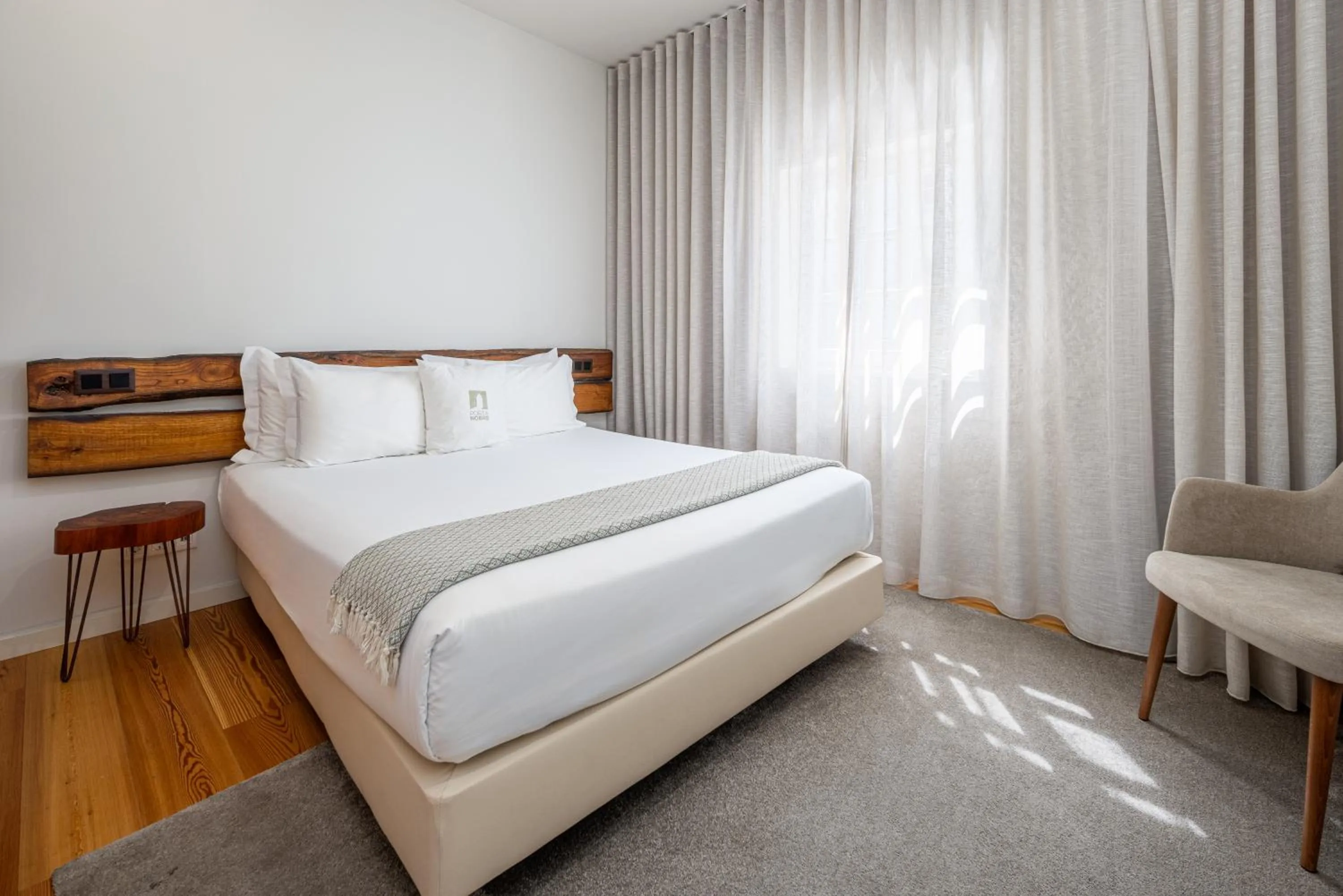 Bed in Porta Nobre Boutique Hotel by Aspasios