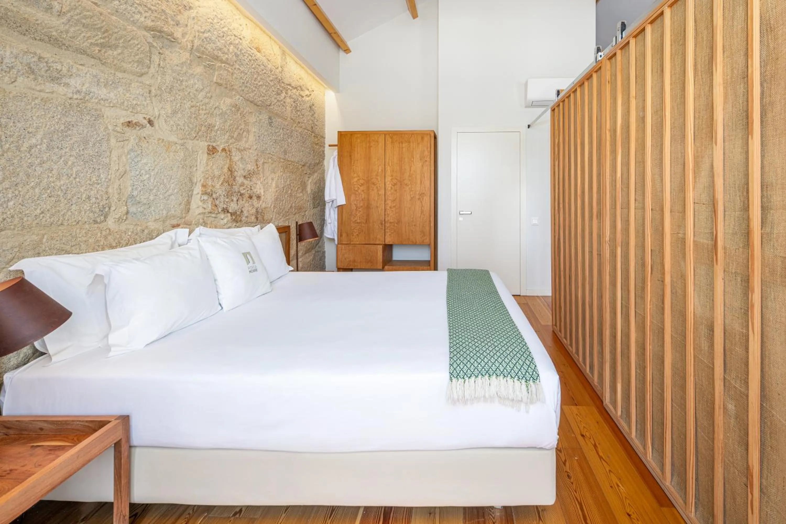 Bed in Porta Nobre Boutique Hotel by Aspasios