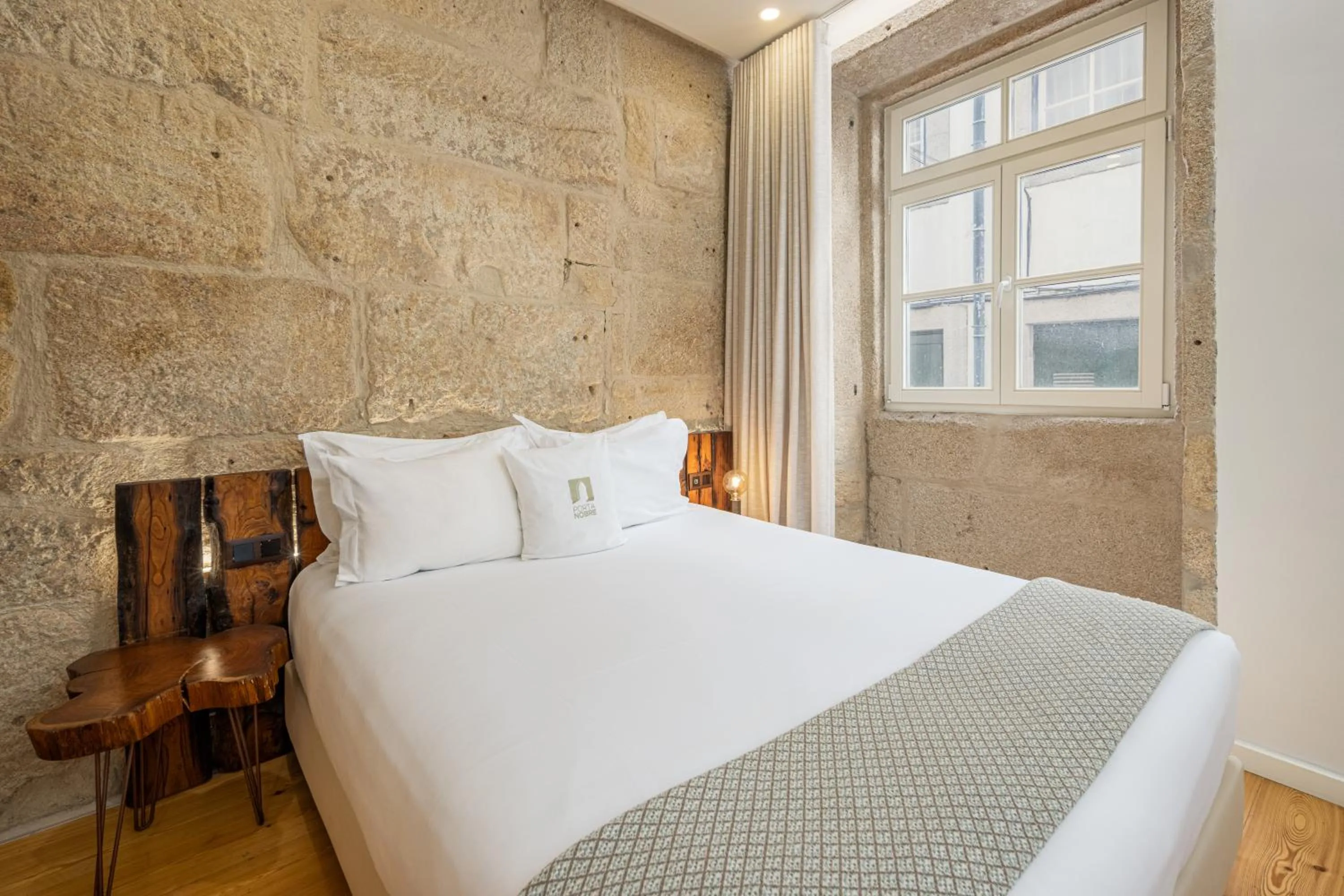 Bed in Porta Nobre Boutique Hotel by Aspasios
