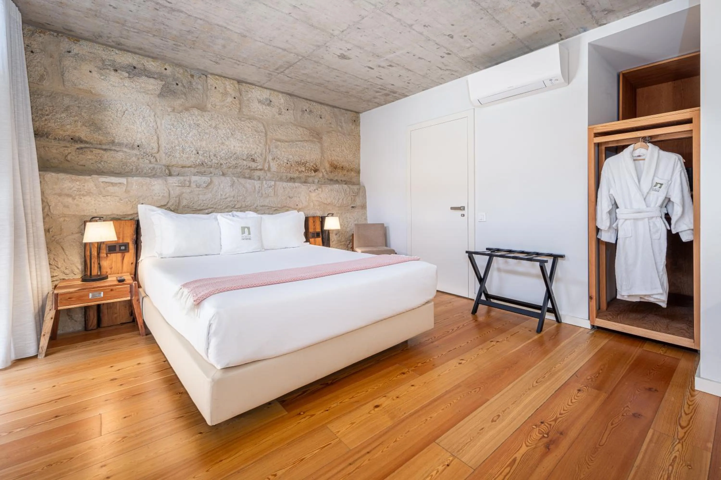 Bed in Porta Nobre Boutique Hotel by Aspasios