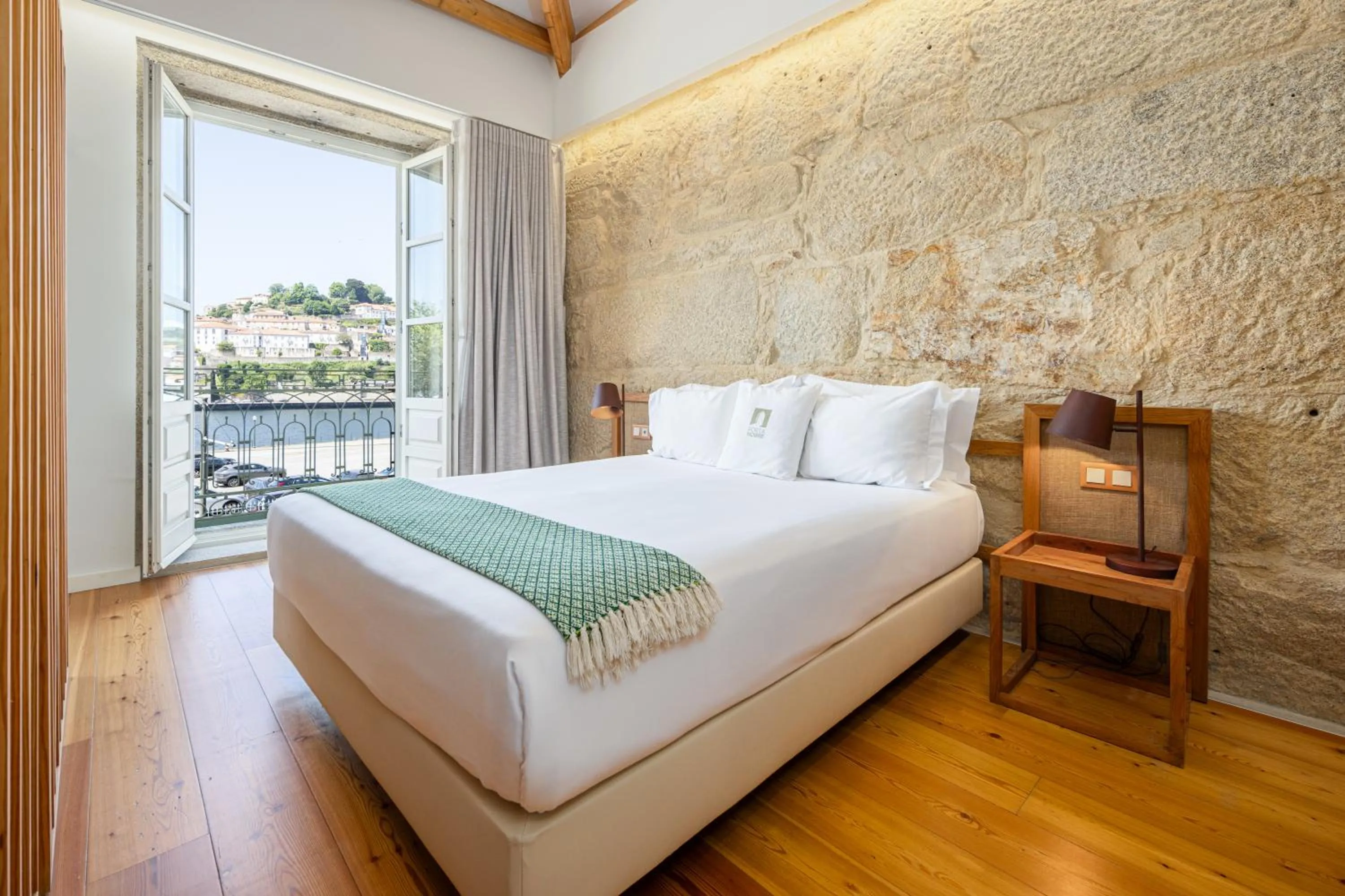 Bed in Porta Nobre Boutique Hotel by Aspasios