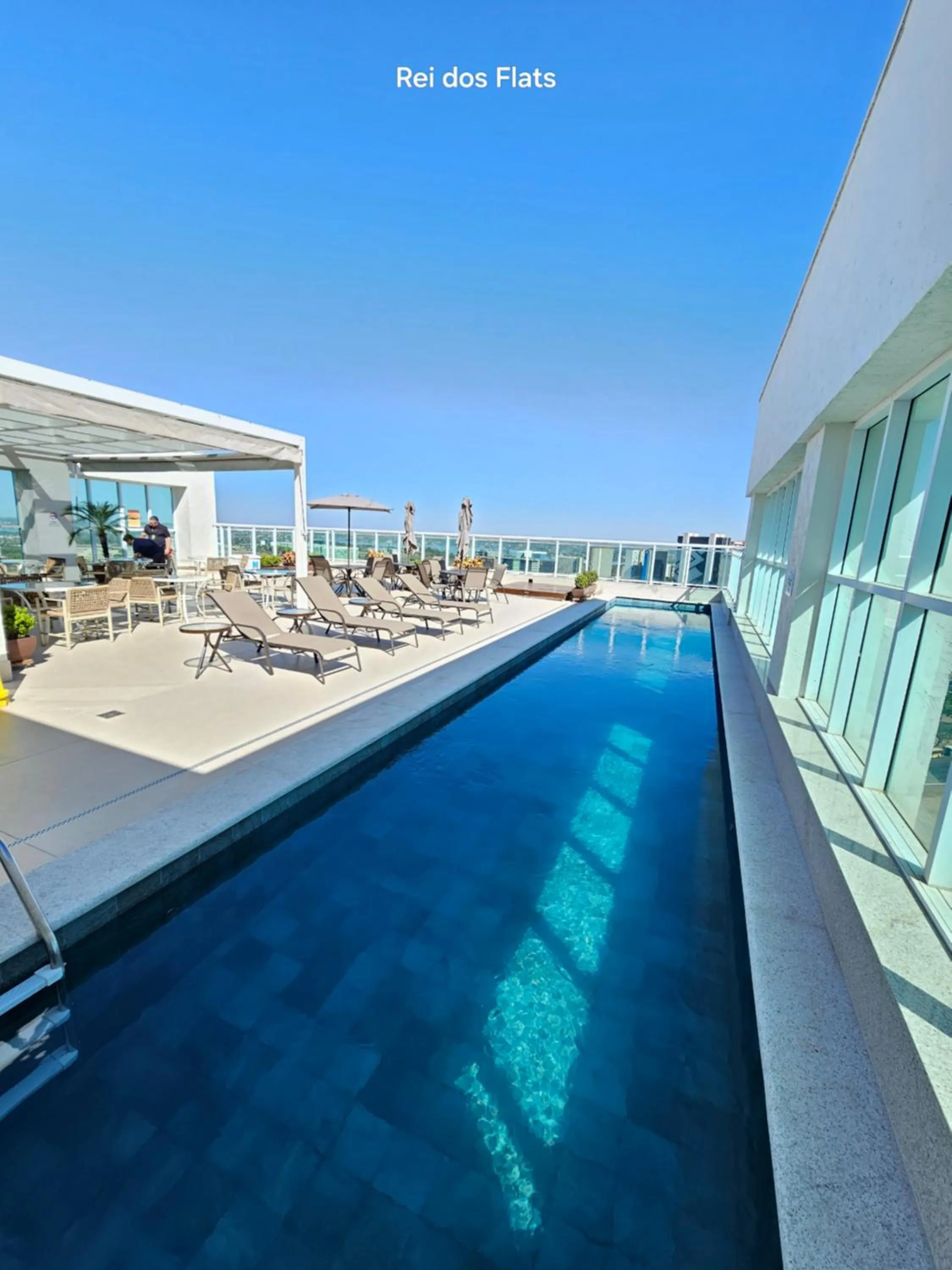 Swimming pool in Flat Saint Moritz Express By Rei dos Flats