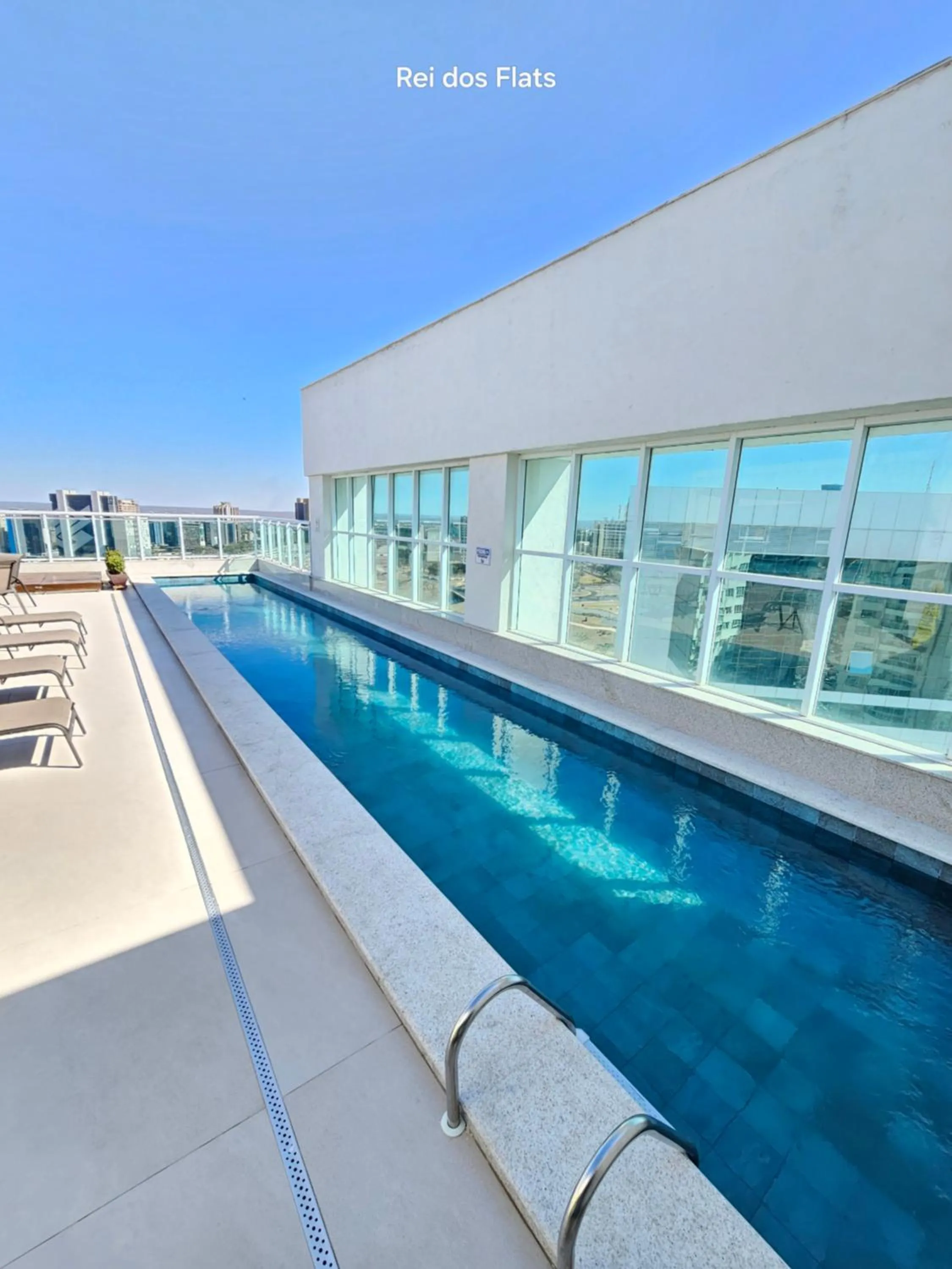 Swimming pool in Flat Saint Moritz Express By Rei dos Flats