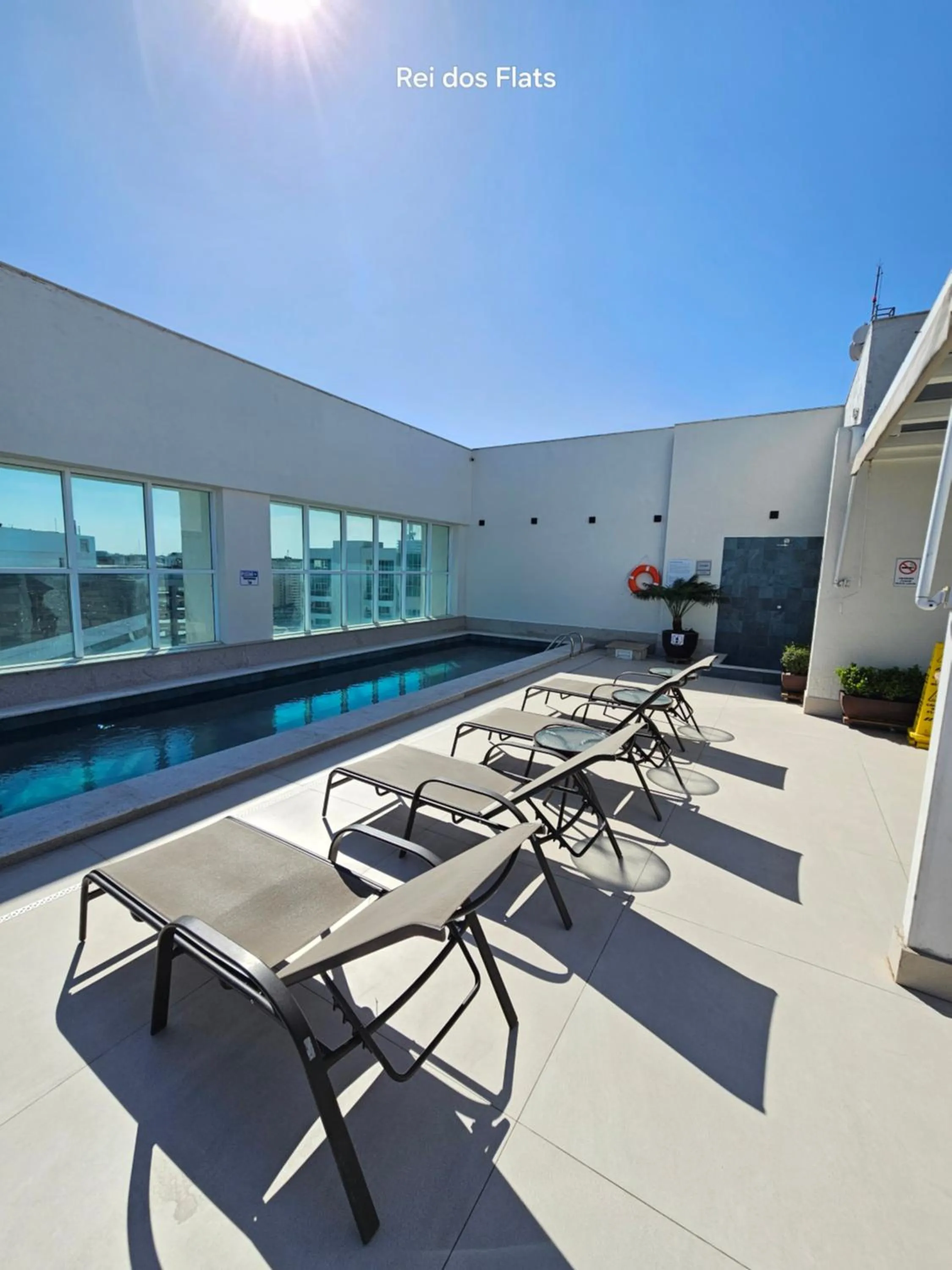 Swimming pool in Flat Saint Moritz Express By Rei dos Flats