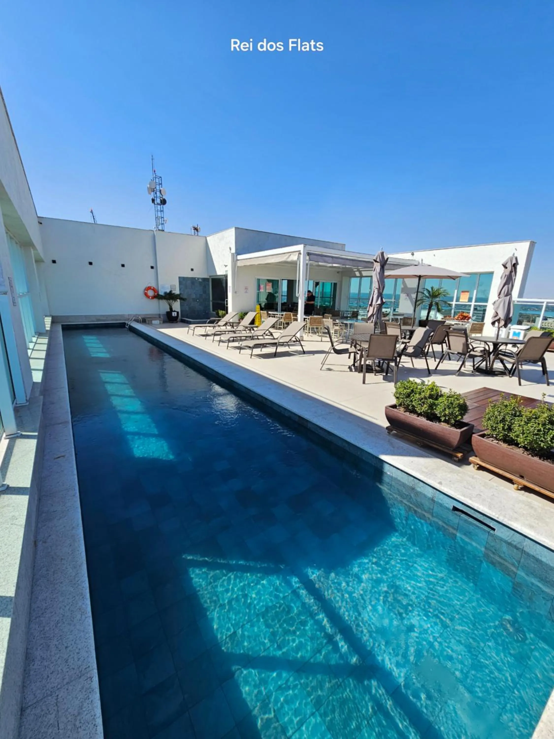 Swimming pool in Flat Saint Moritz Express By Rei dos Flats