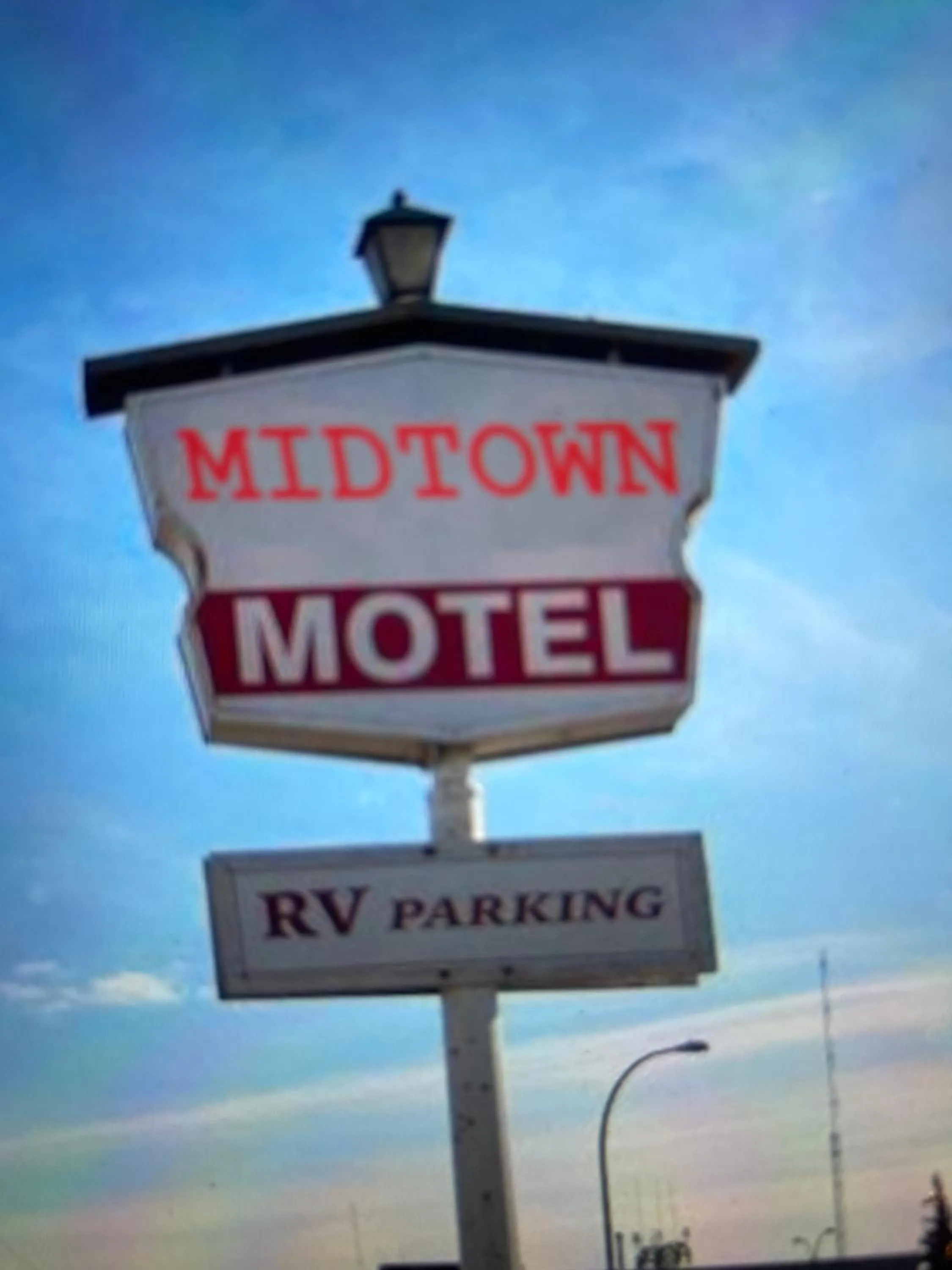 Logo/Certificate/Sign in Midtown Motel on Alaska Ave