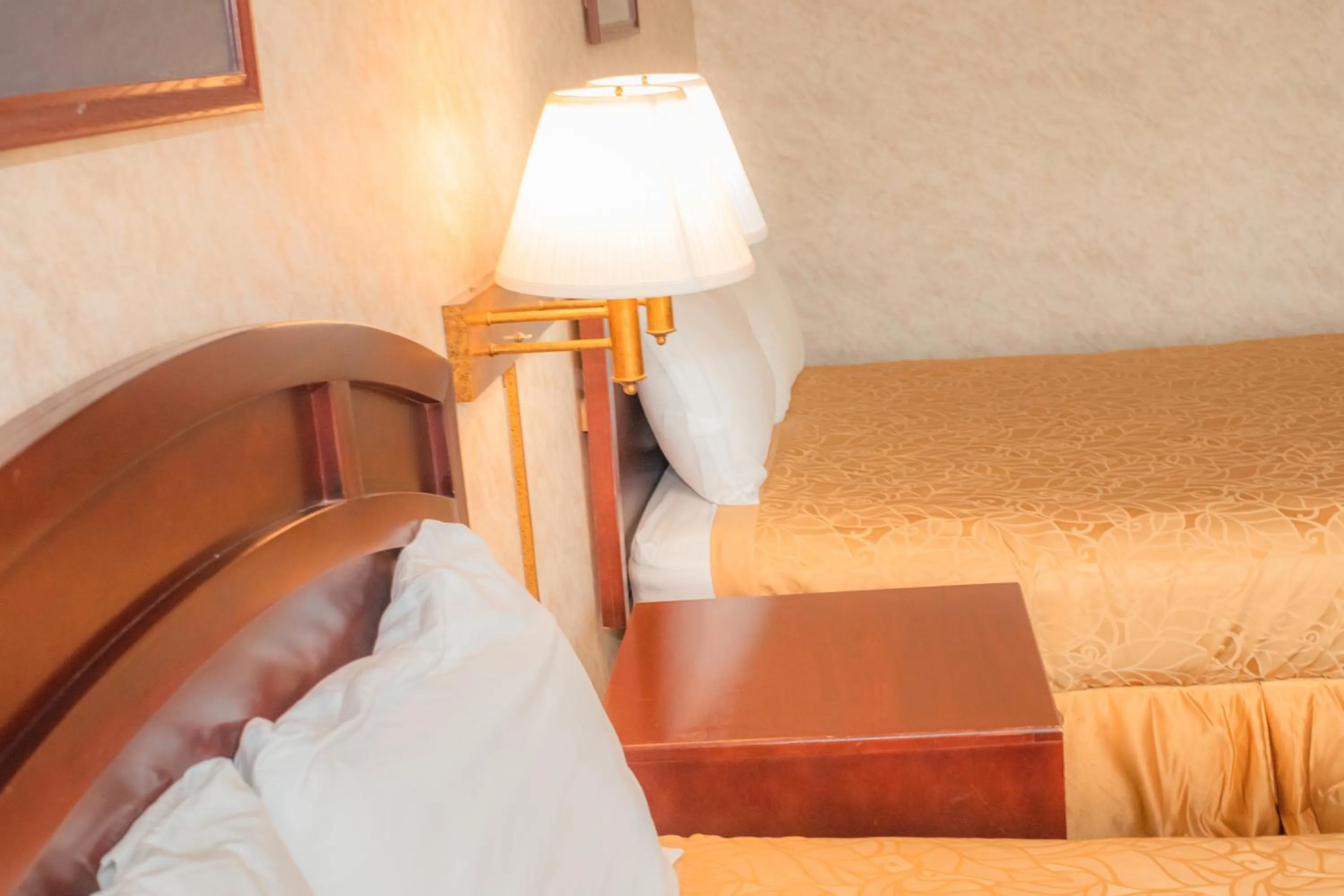 Bed in Colfax Inn By Marifah