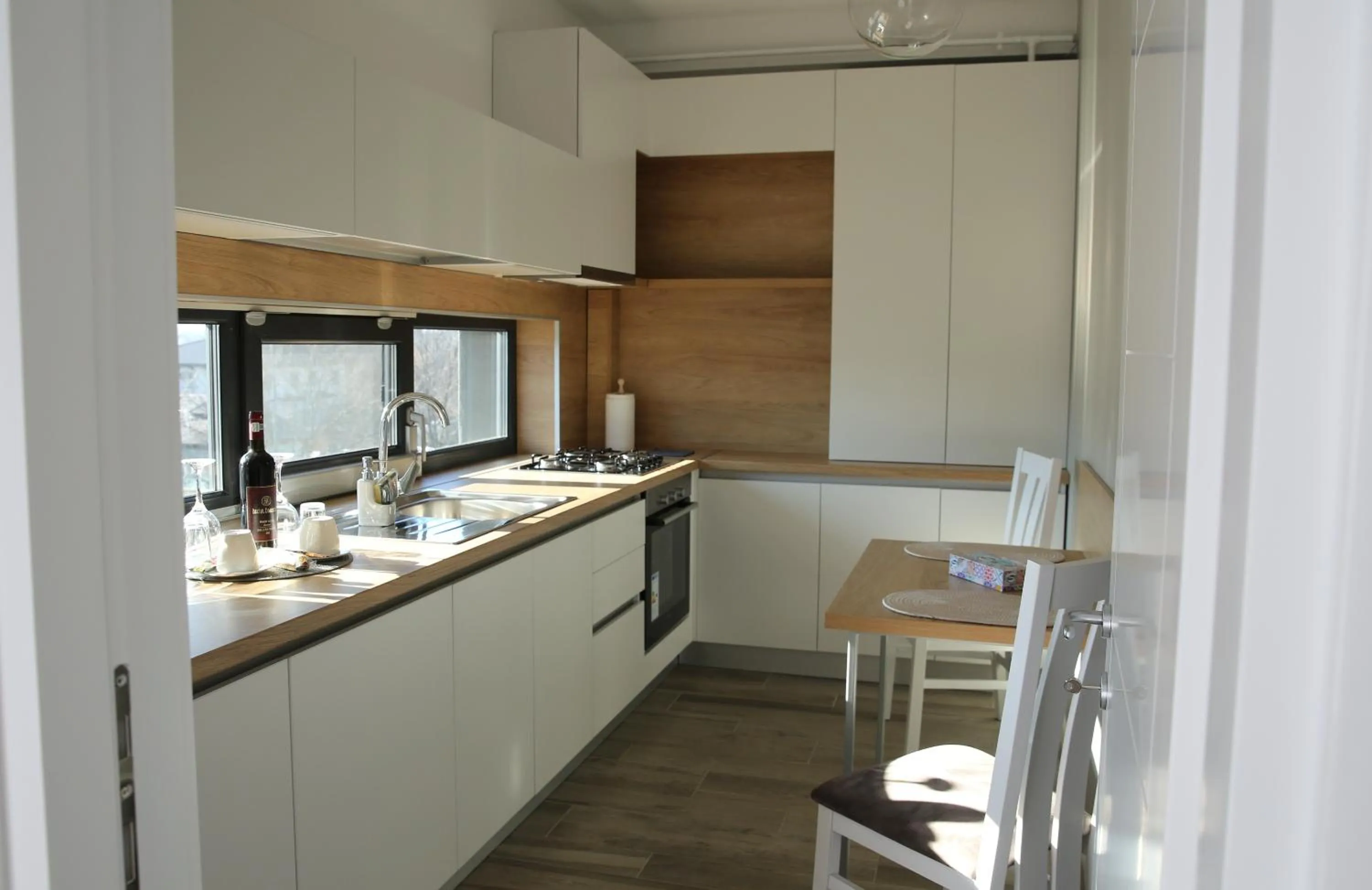 Kitchen or kitchenette in ResHome Apartments&Rooms
