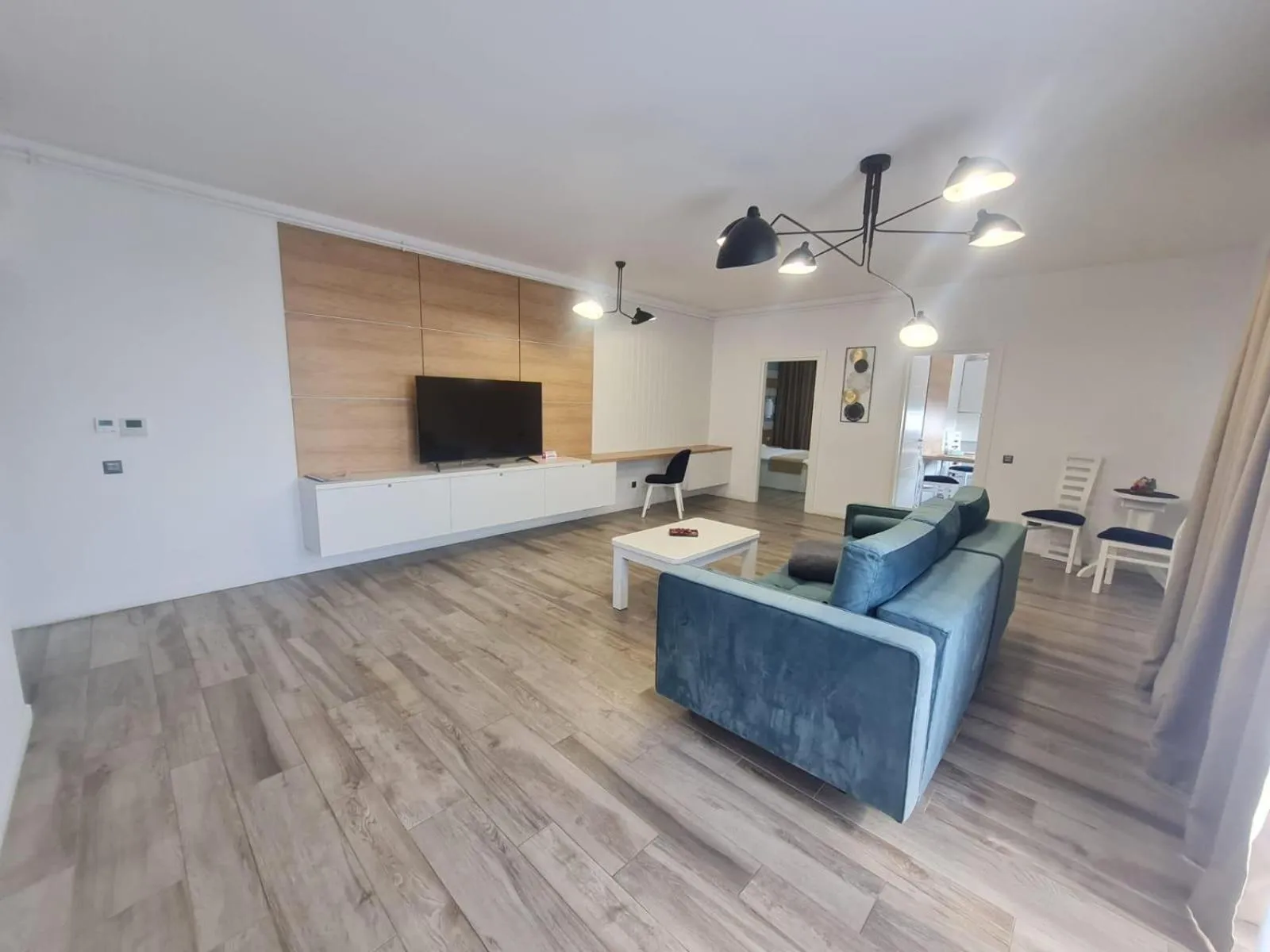 Communal lounge/ TV room in ResHome Apartments&Rooms