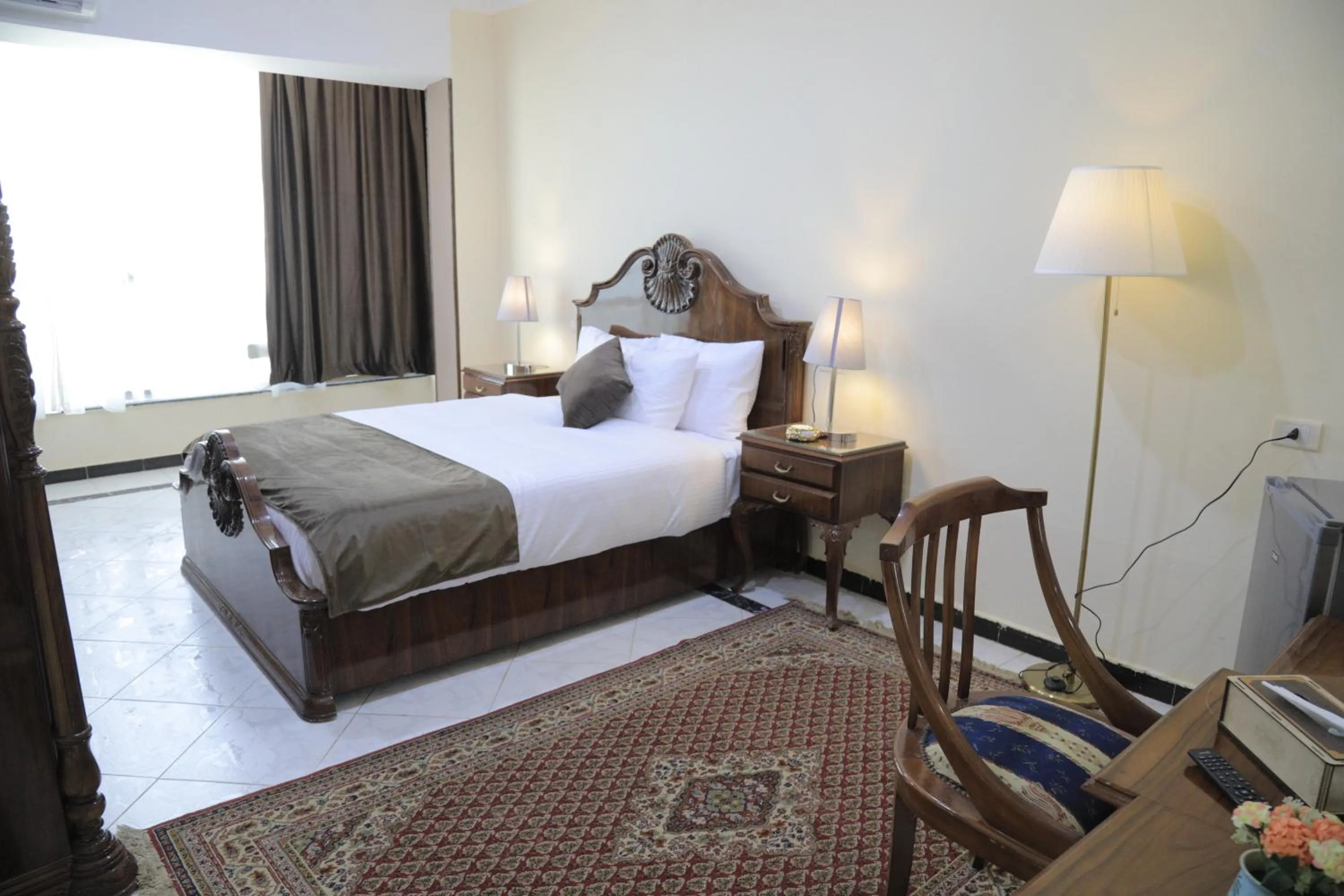 Bed in Jewel Fayed Hotel