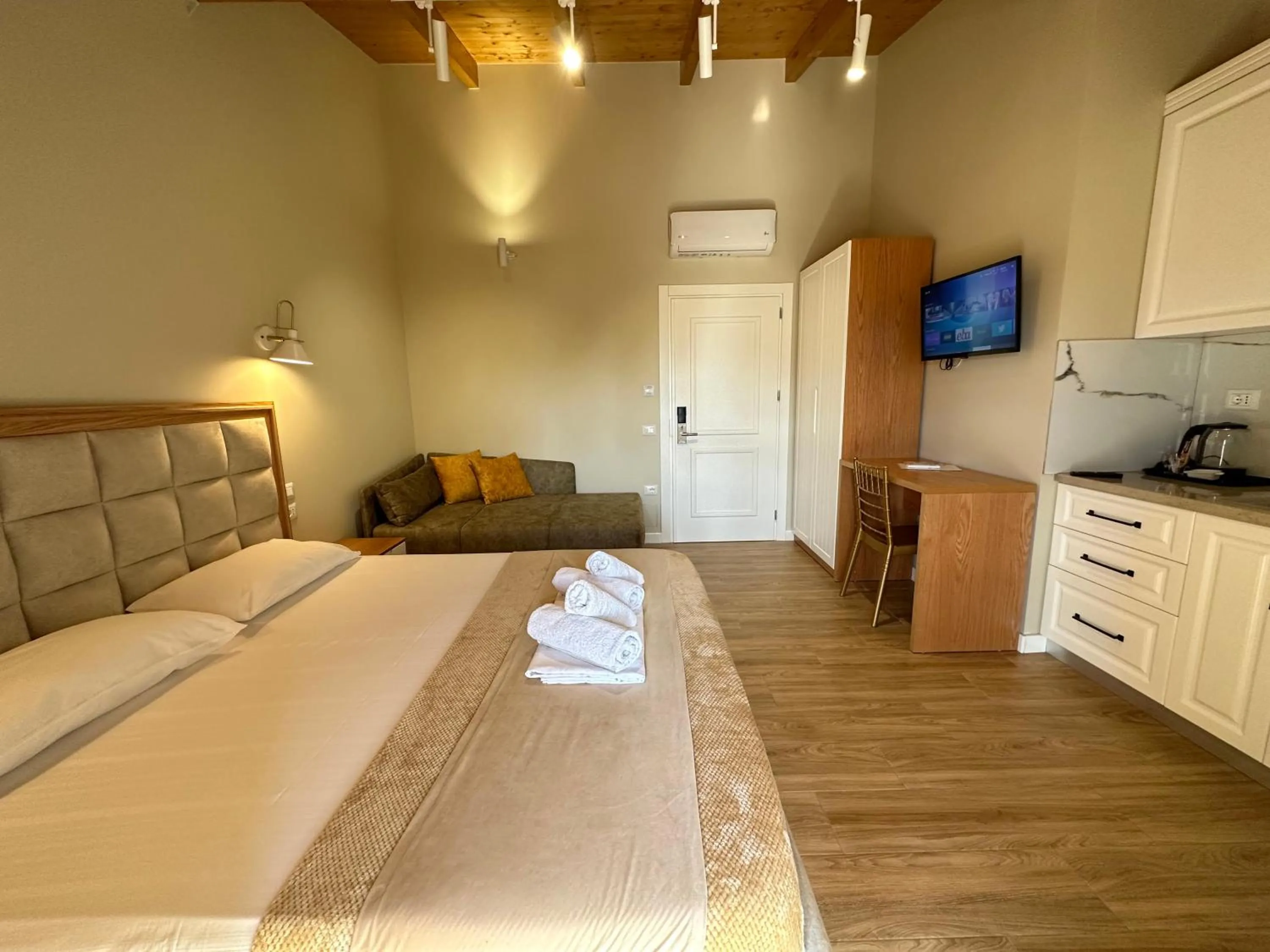 Bed in Arial Penthouse Suites