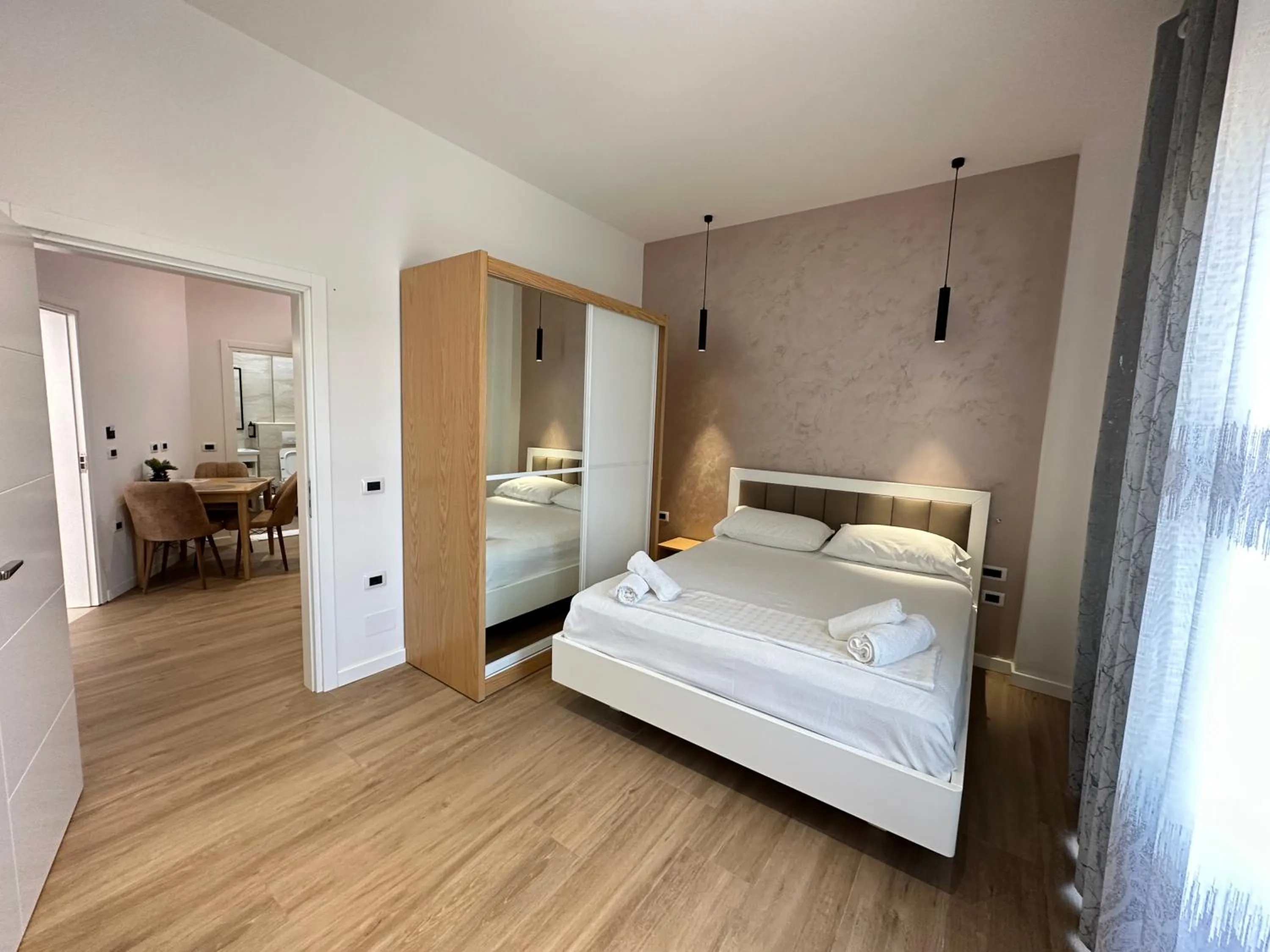 Bed in Arial Penthouse Suites