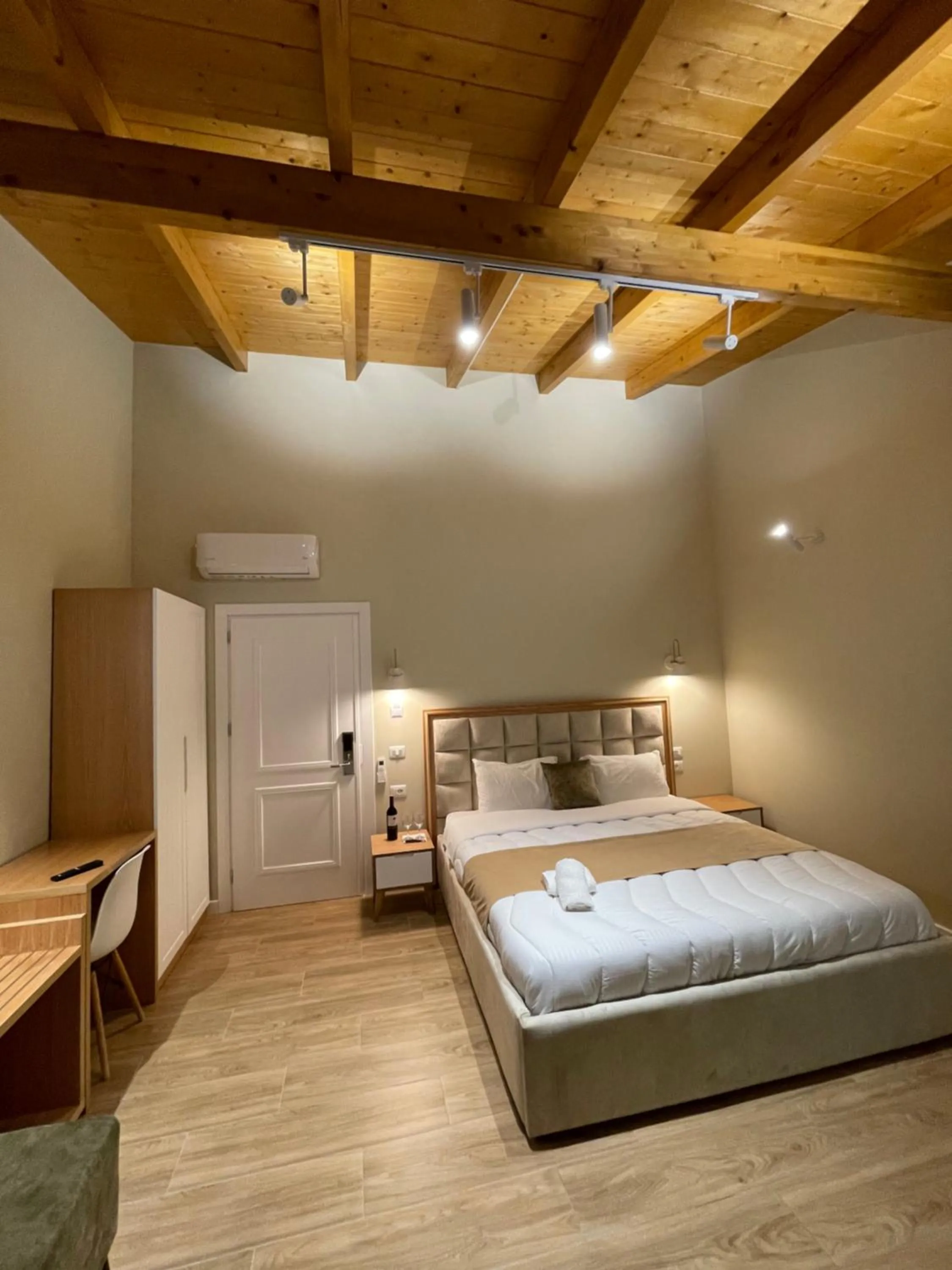 Bed in Arial Penthouse Suites