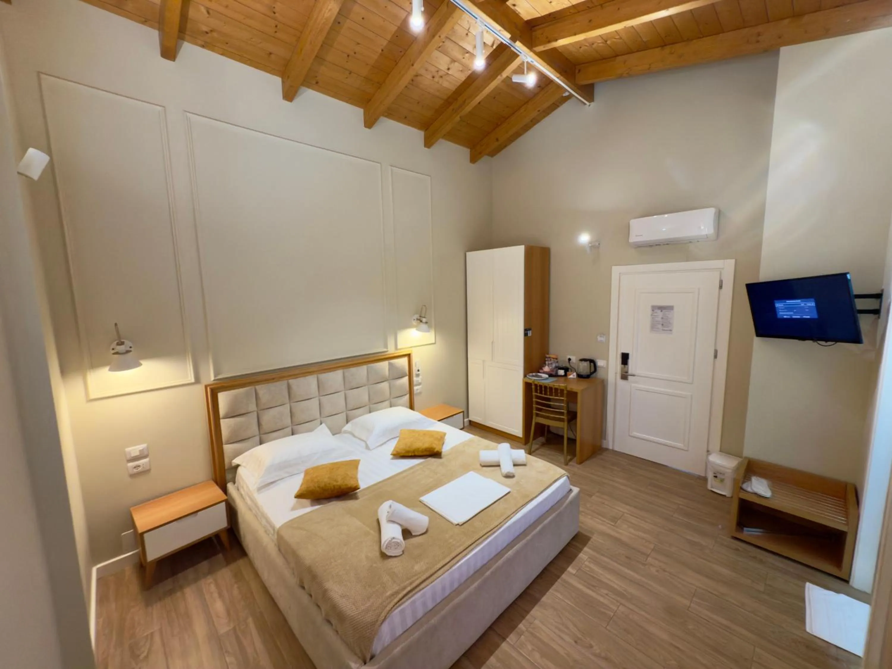 Bed in Arial Penthouse Suites