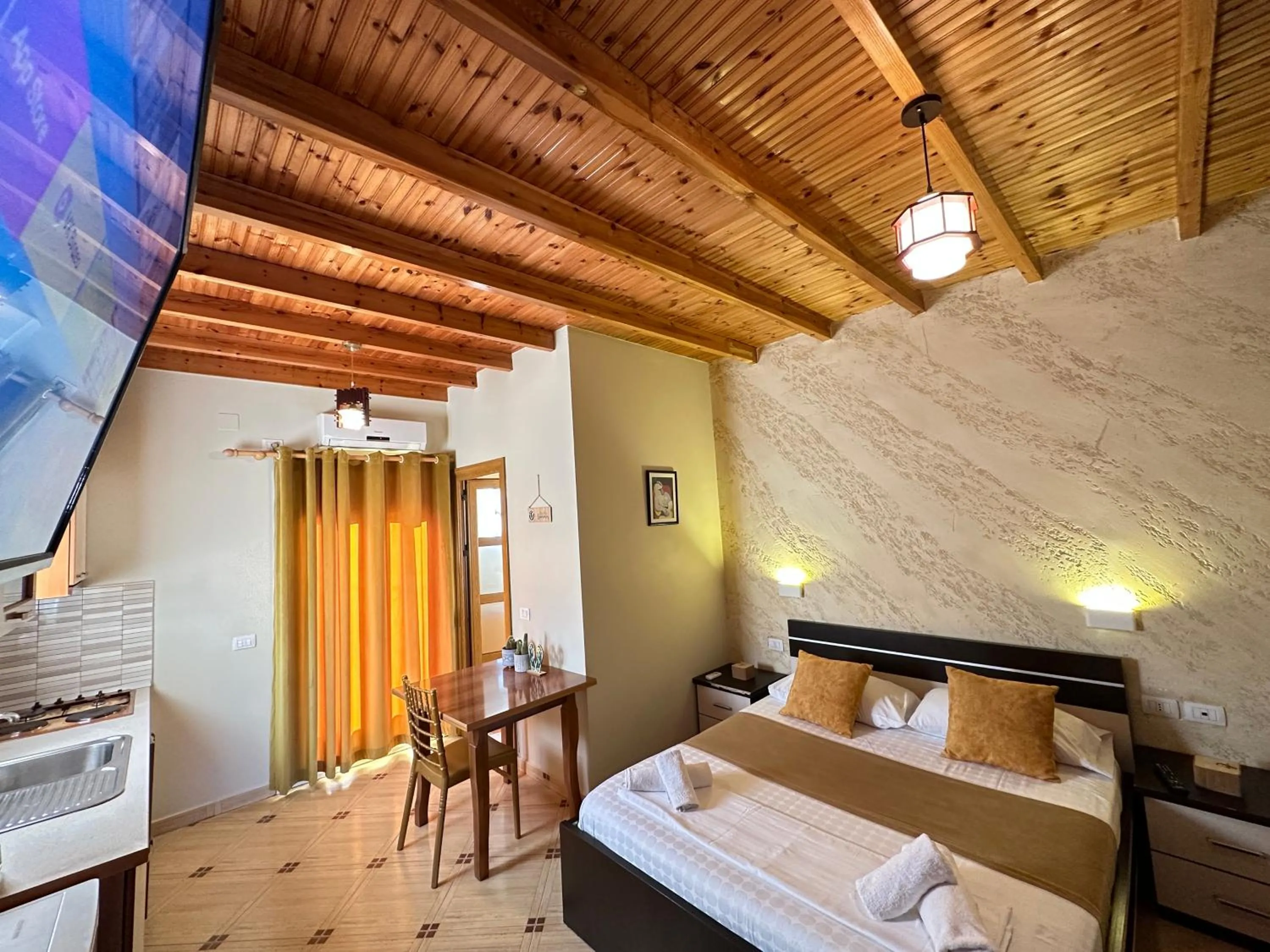 Bed in Arial Penthouse Suites