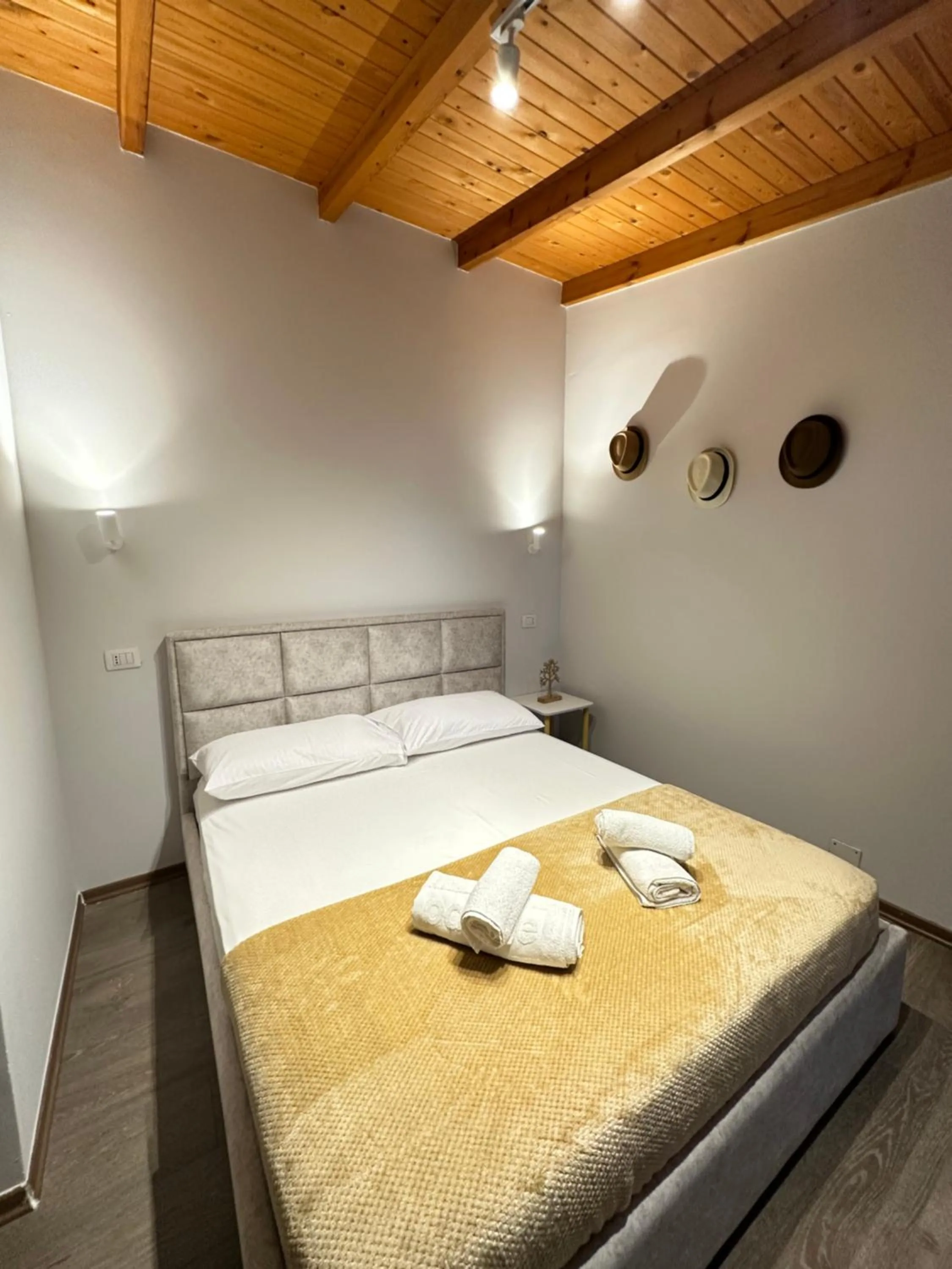 Bed in Arial Penthouse Suites