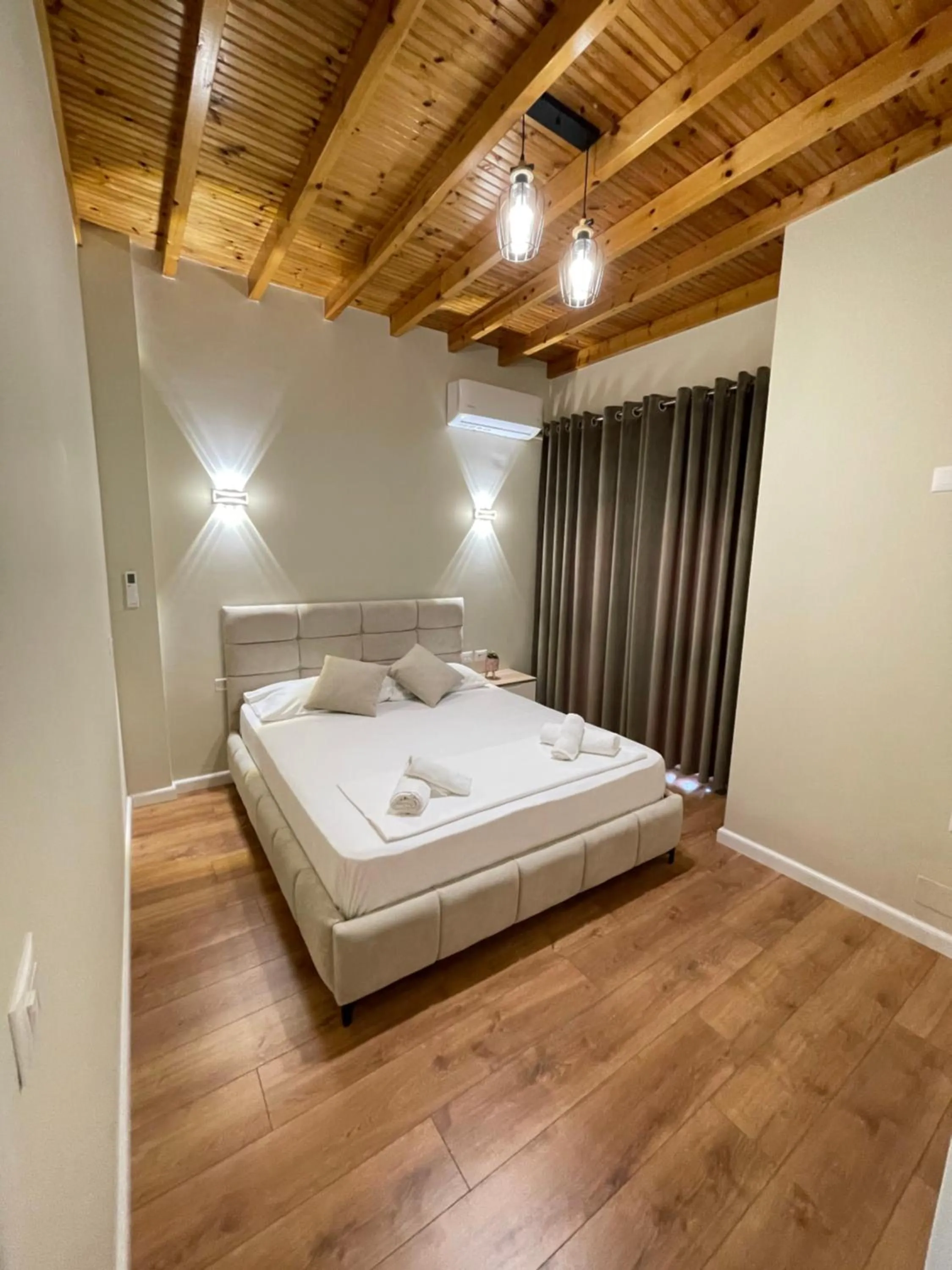 Bed in Arial Penthouse Suites