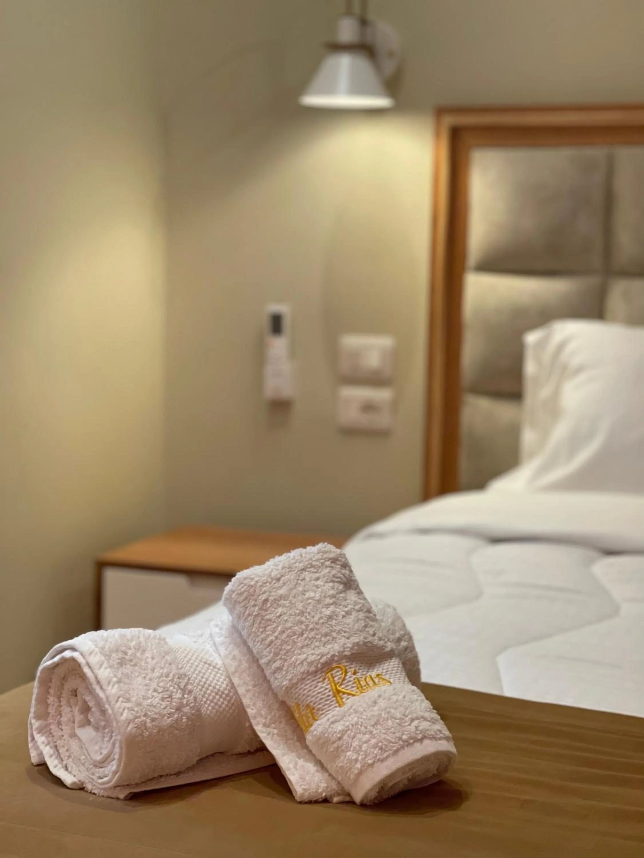 Bed in Arial Penthouse Suites