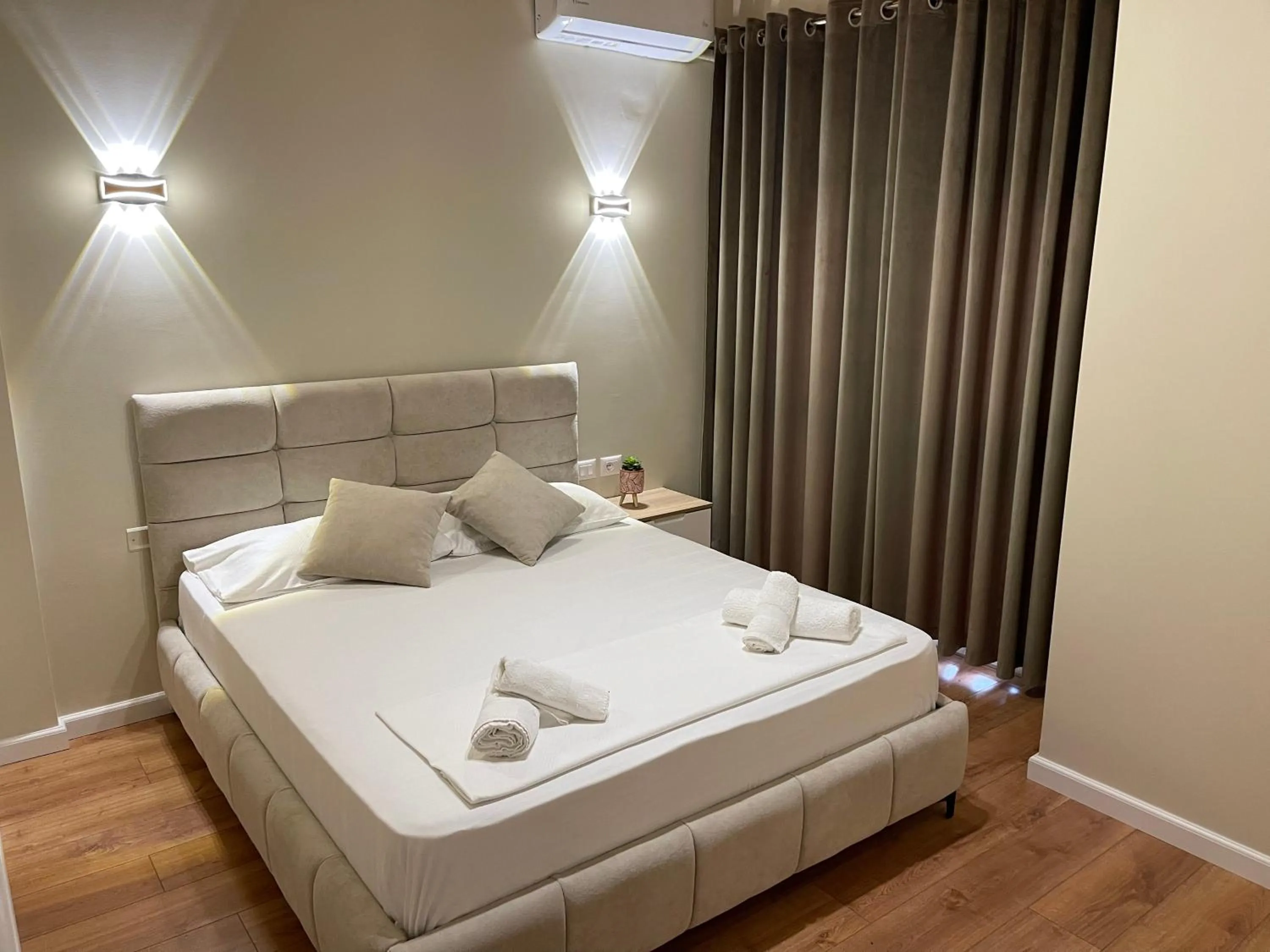 Bed in Arial Penthouse Suites