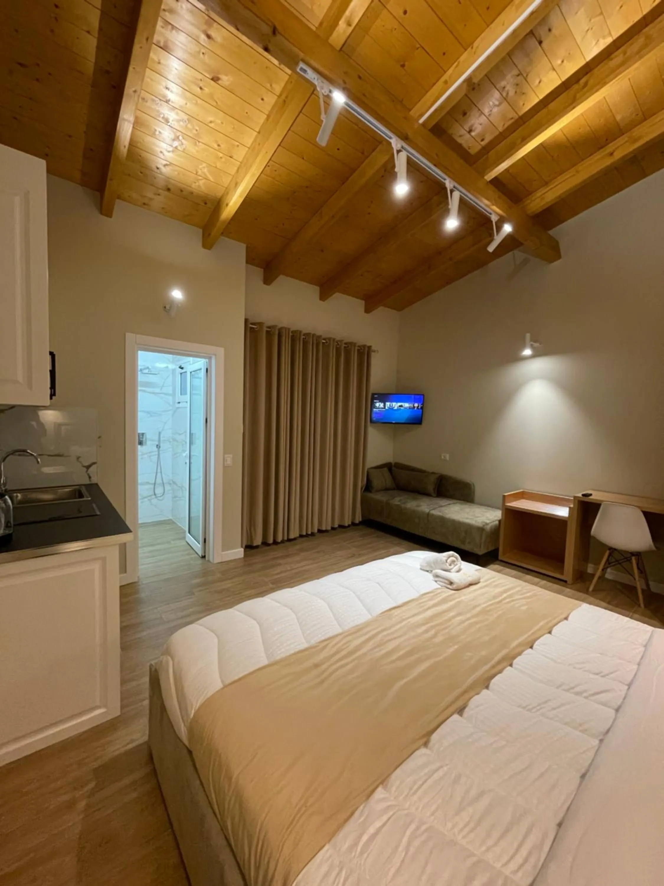 Bed in Arial Penthouse Suites