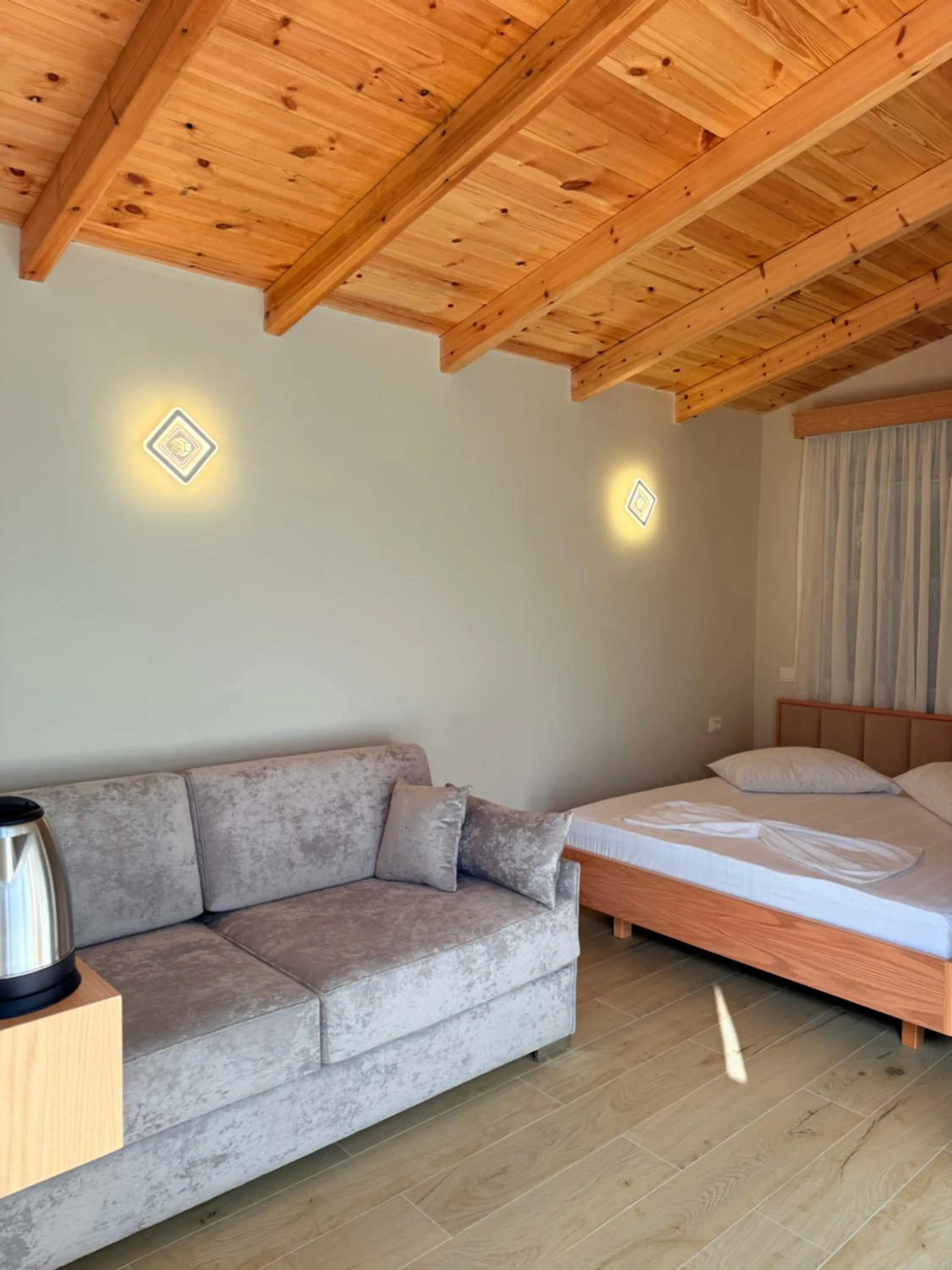 Bed in Arial Penthouse Suites