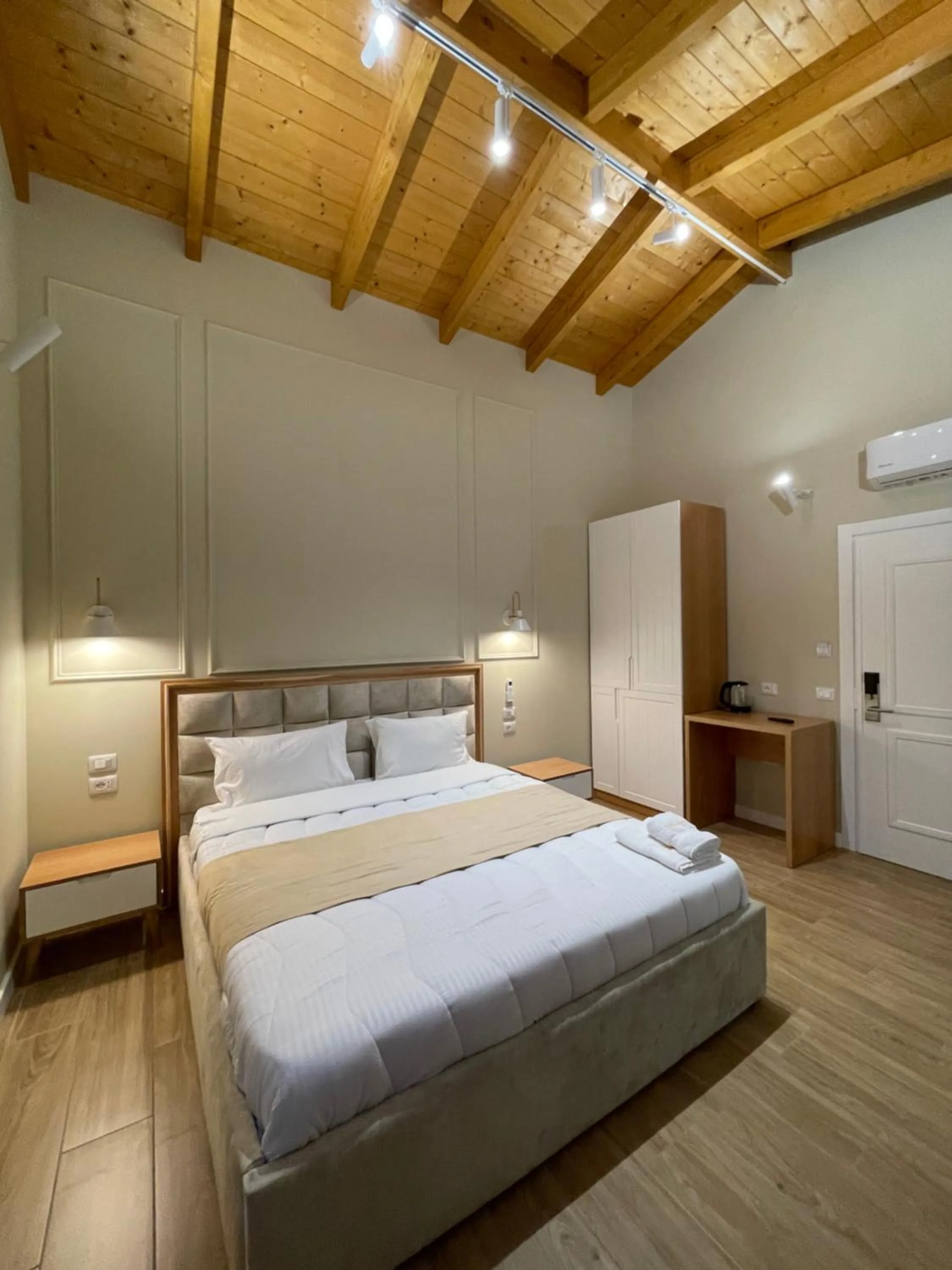 Bed in Arial Penthouse Suites