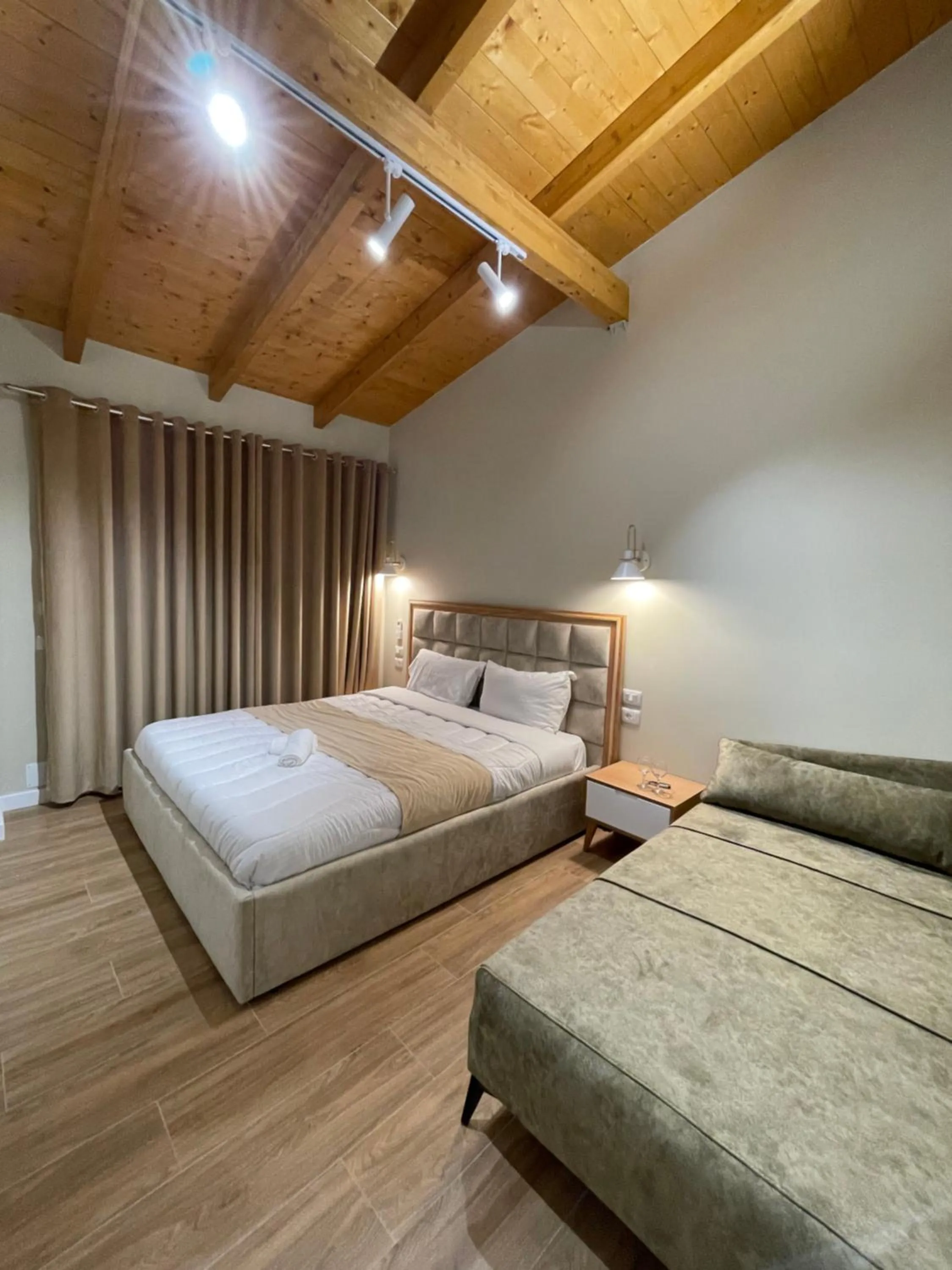 Bed in Arial Penthouse Suites