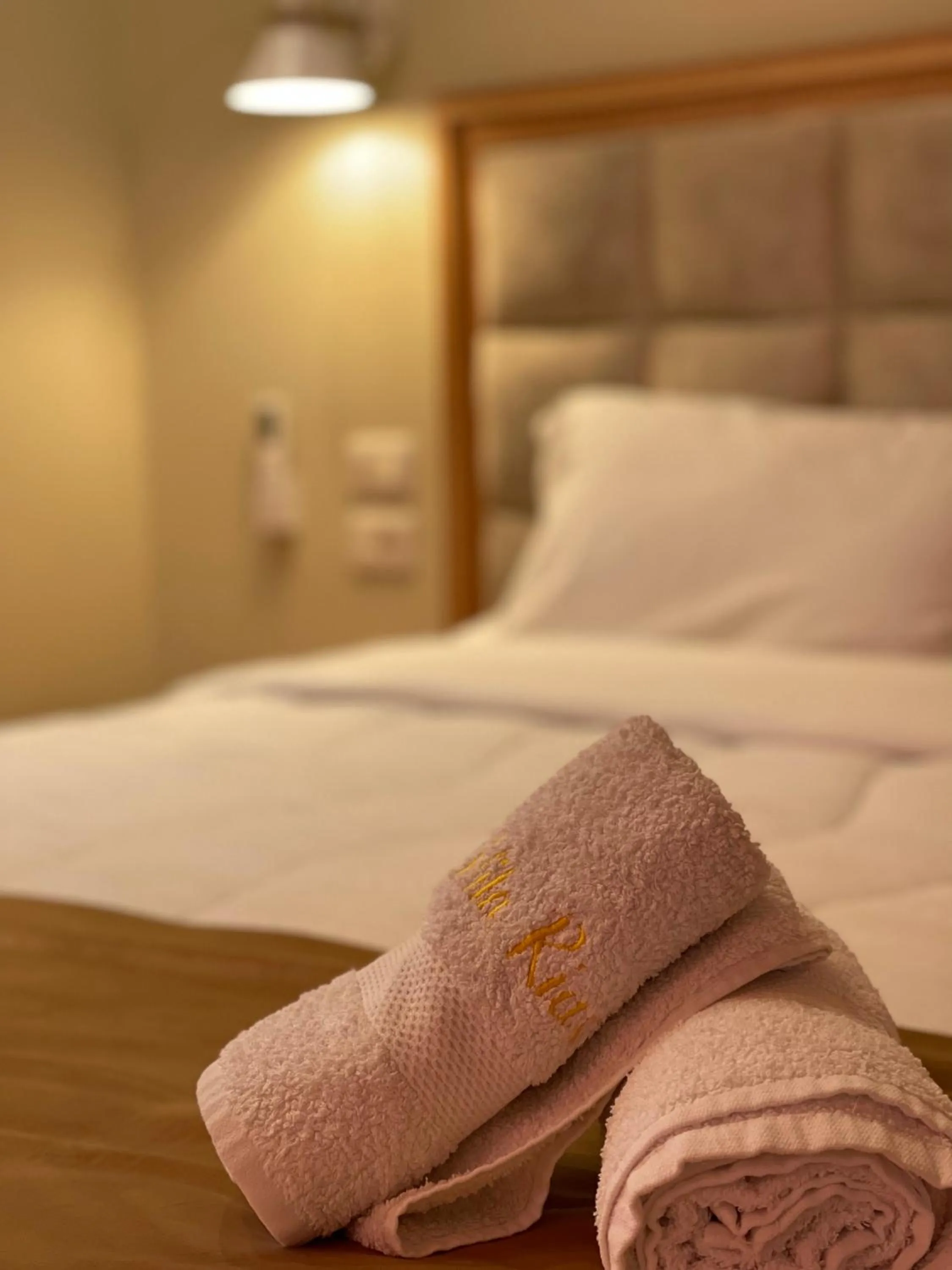 Bed in Arial Penthouse Suites