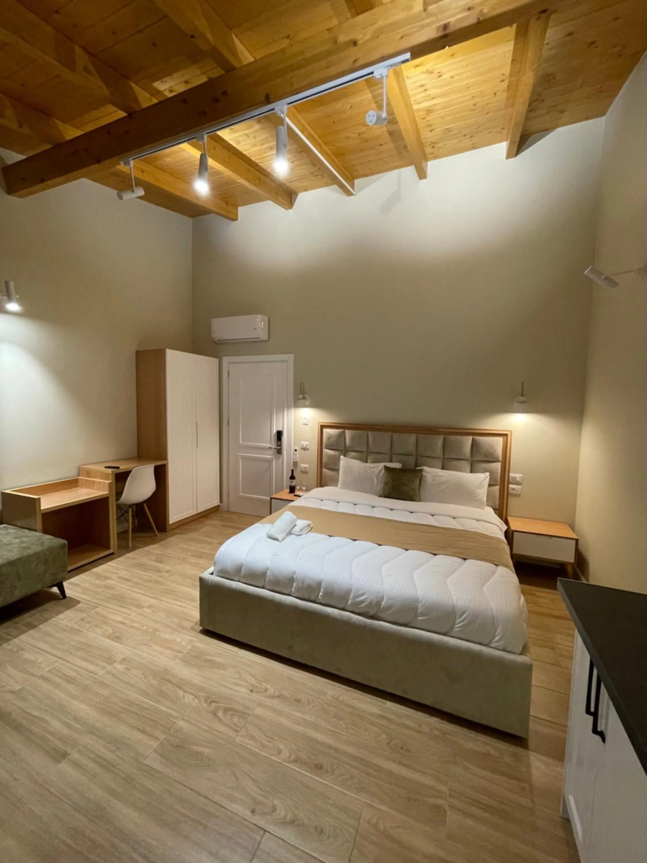 Bed in Arial Penthouse Suites