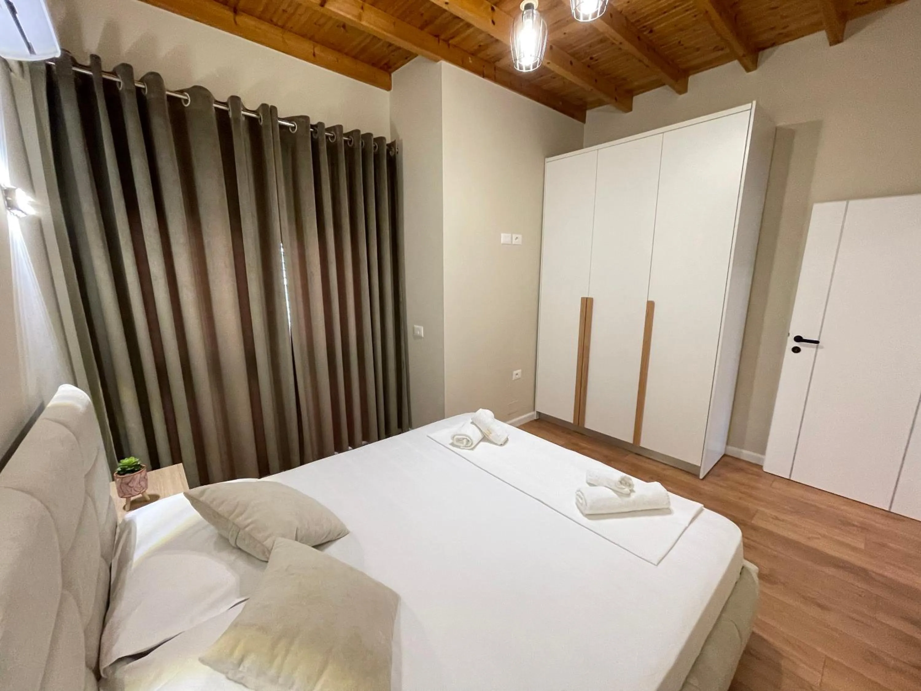 Bed in Arial Penthouse Suites