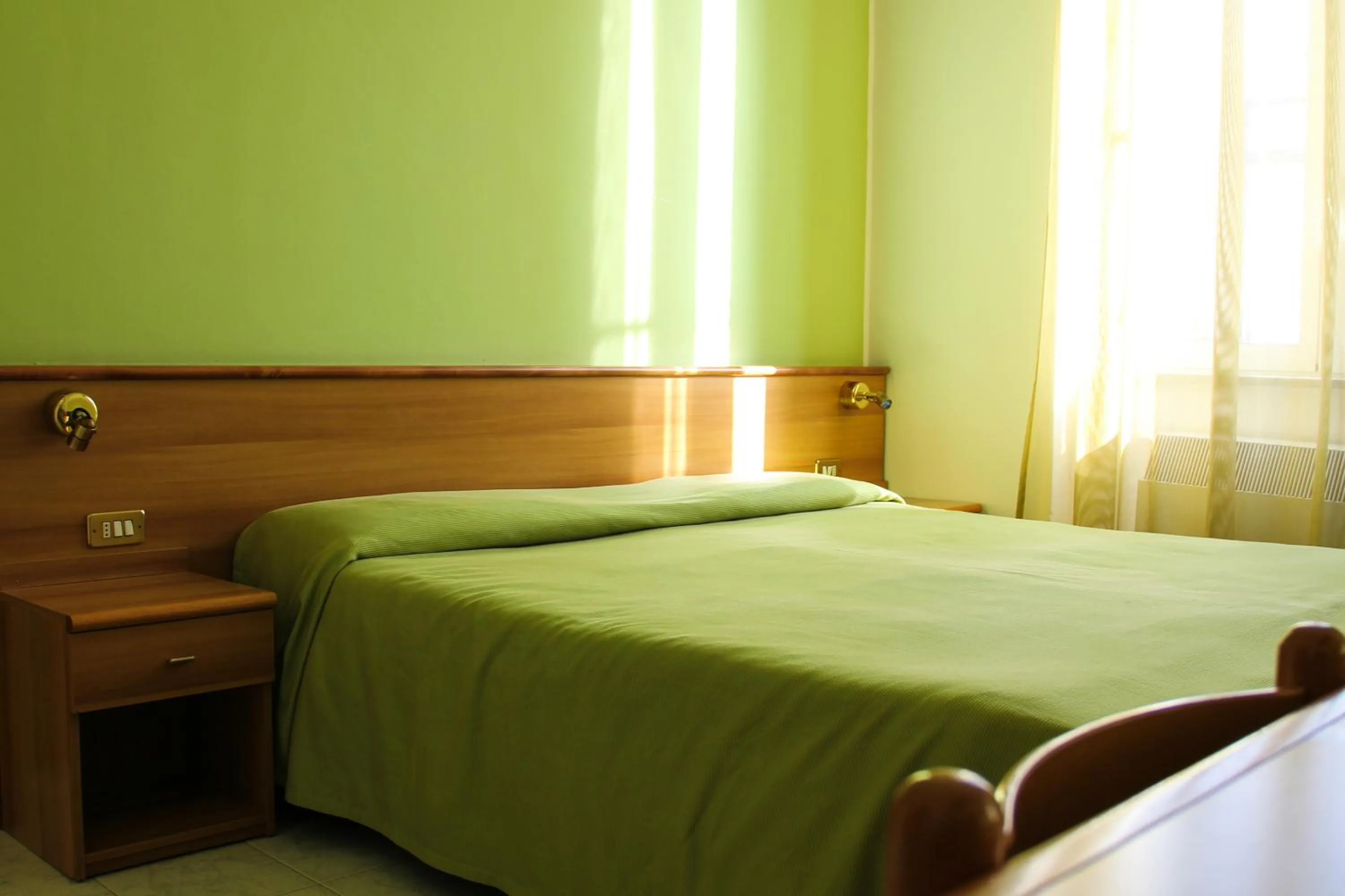 Bed in Hotel Santa Marta