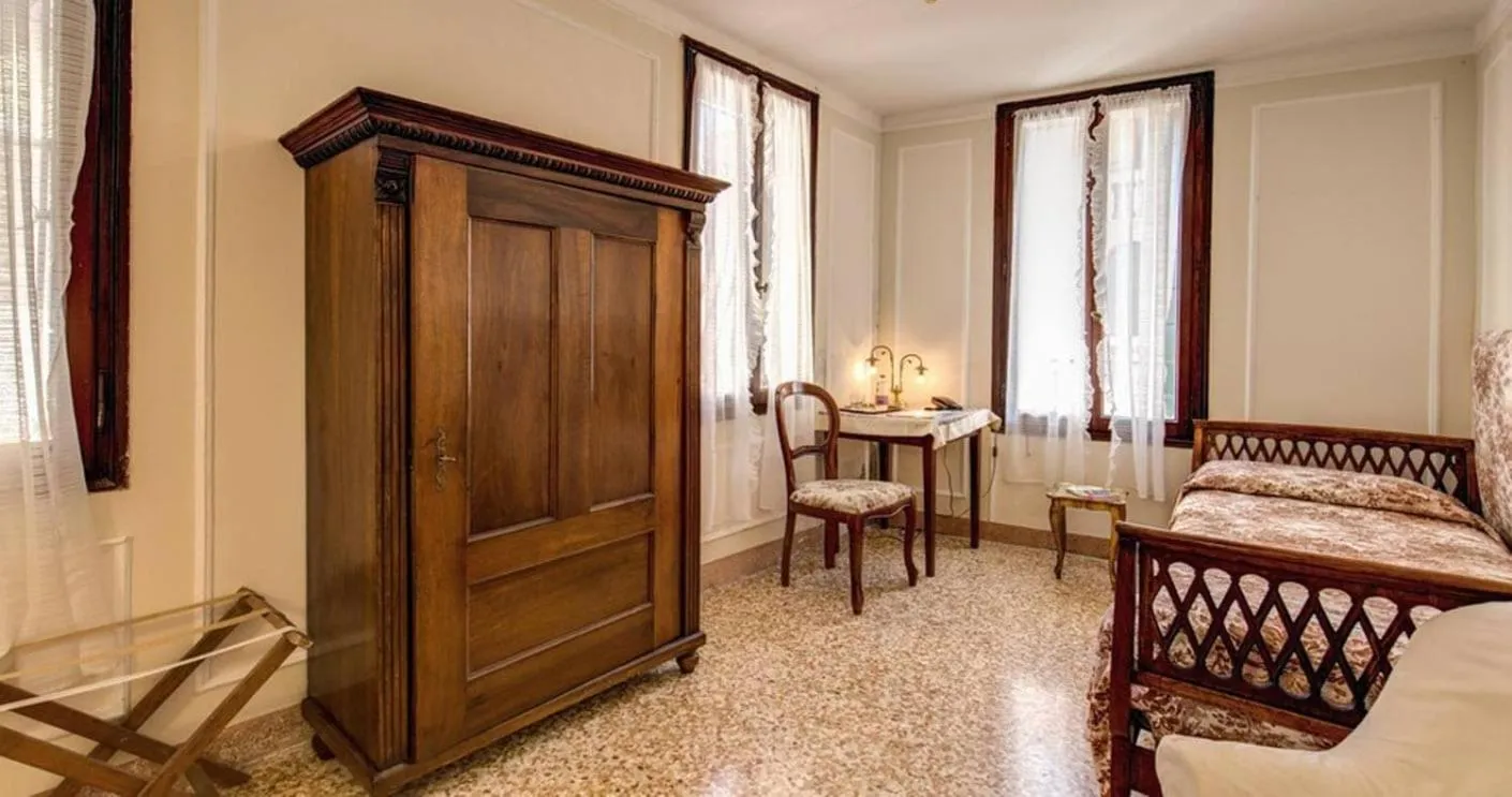 Bed in Pensione Seguso