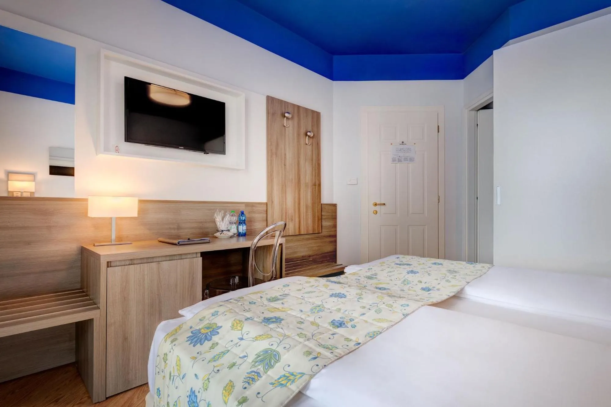 Bed in Hotel Cavalieri Palace & Suites