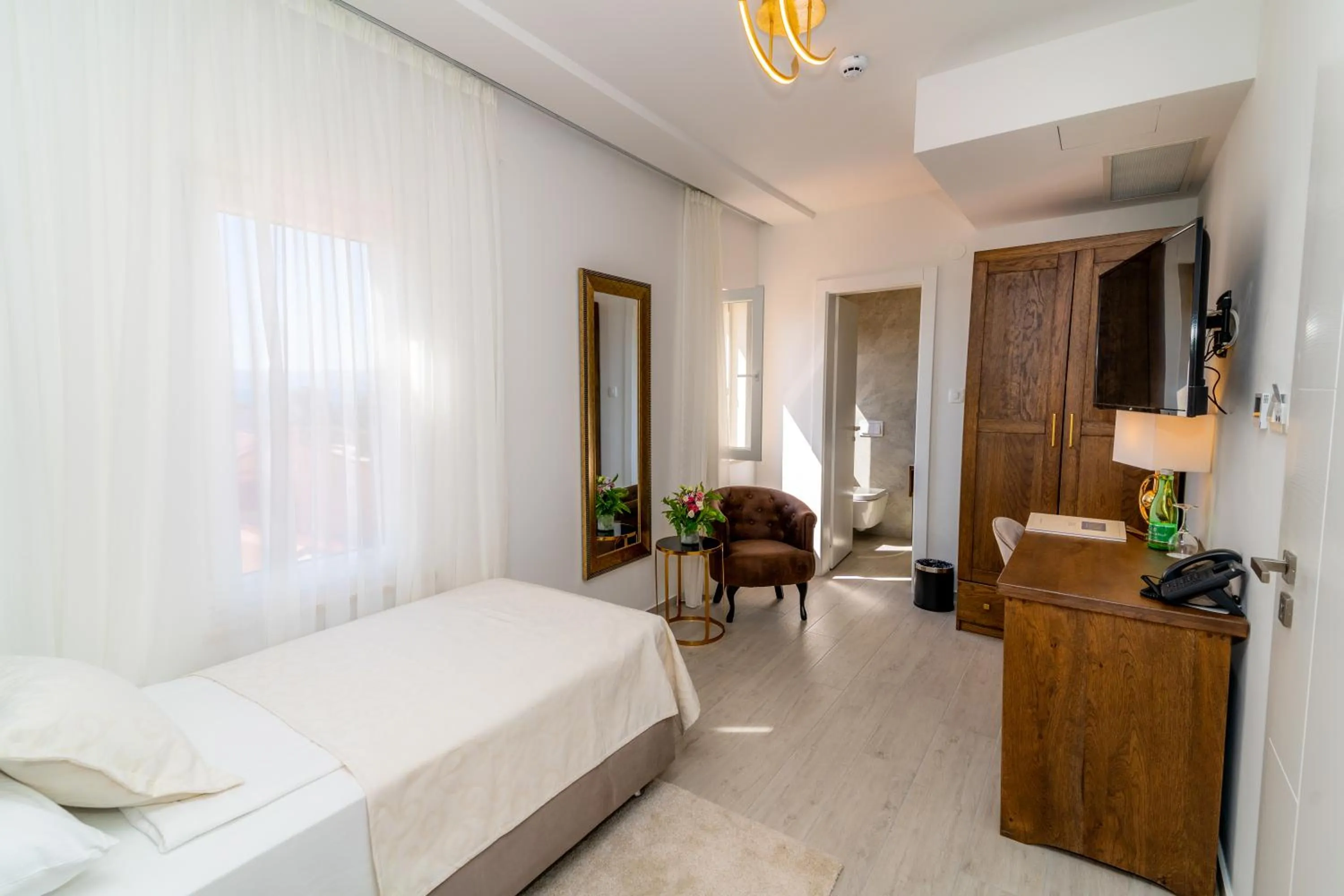 Bed in Heritage Hotel Stypia