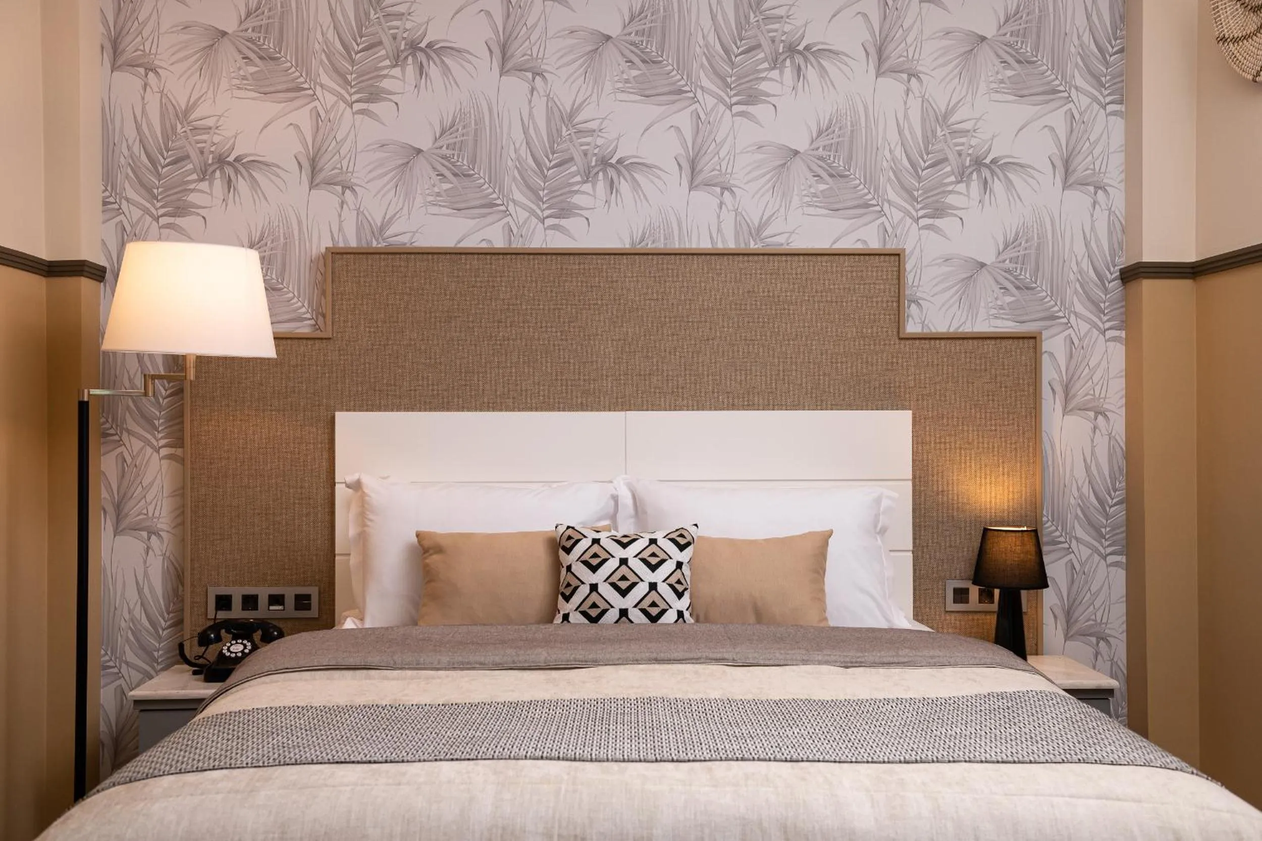 Bed in ELLE Rooms & Suites