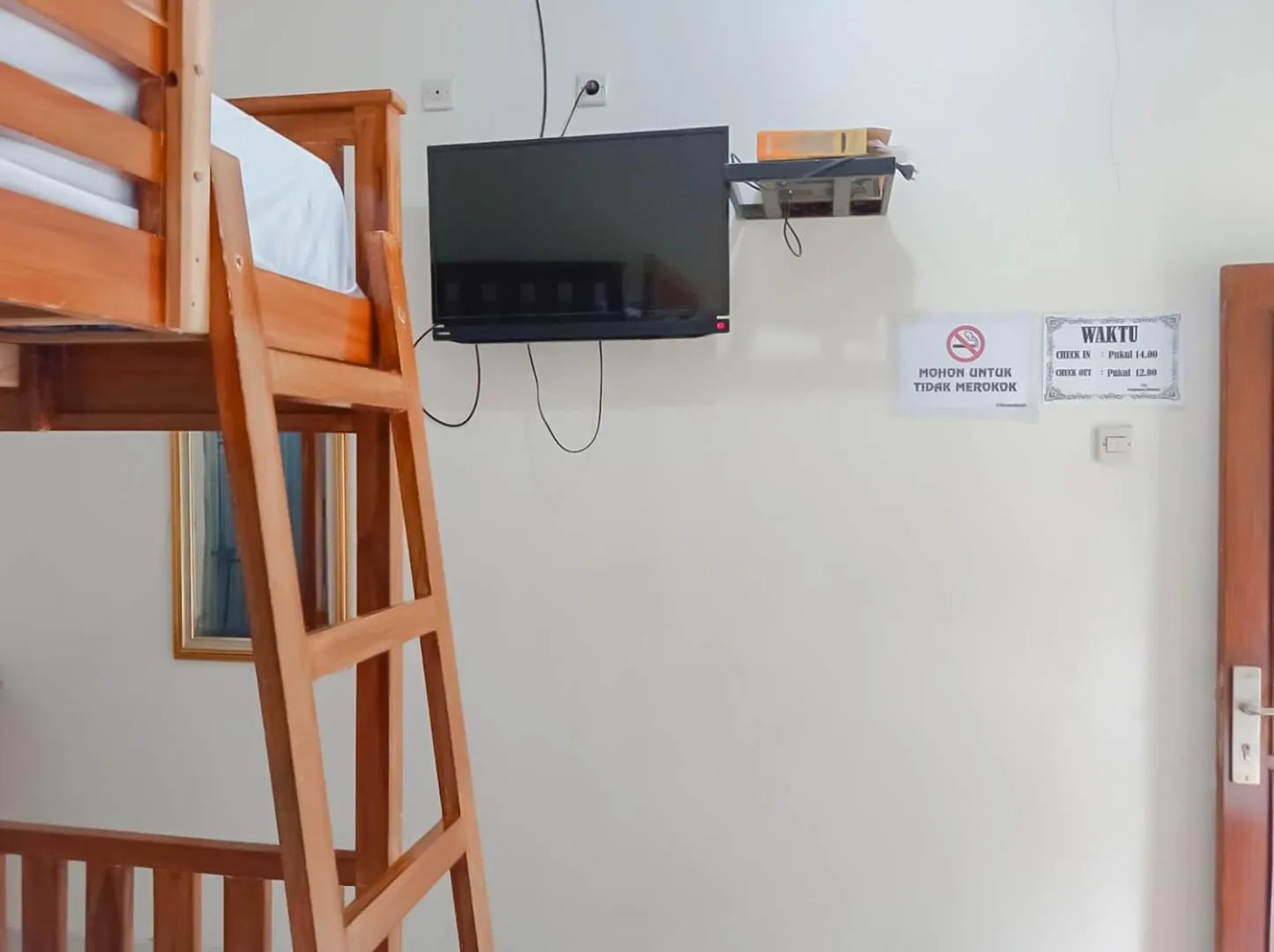 TV and multimedia in Penginapan Al Firdausi Syariah Mitra RedDoorz