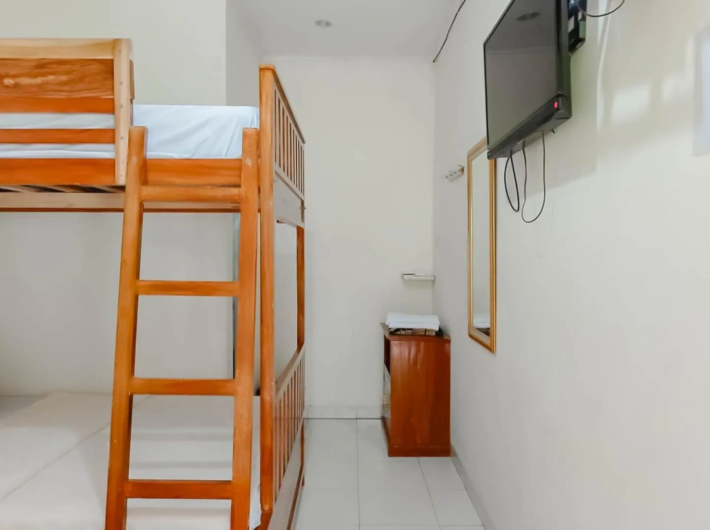 bunk bed, Bed in Penginapan Al Firdausi Syariah Mitra RedDoorz