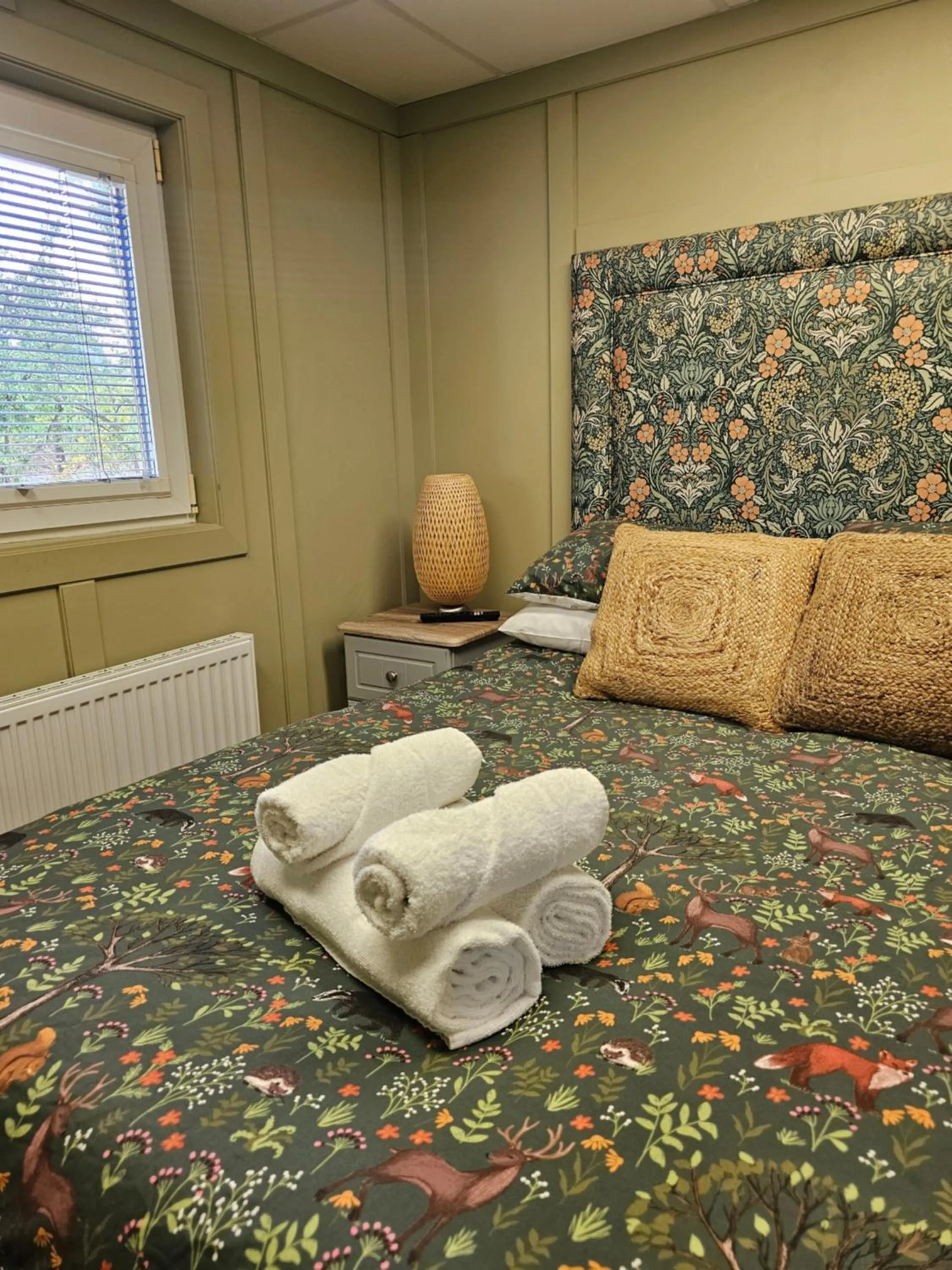 Bed in Walsh's Mill Lodges & Linen House