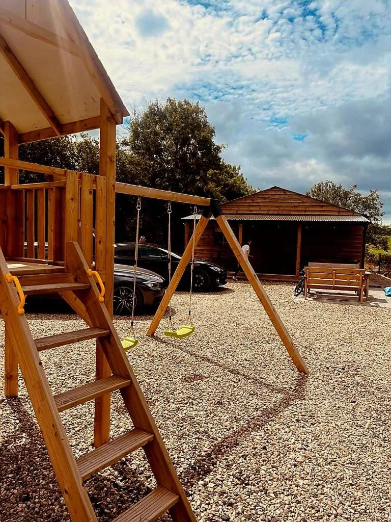 Children play ground in Walsh's Mill Lodges & Linen House
