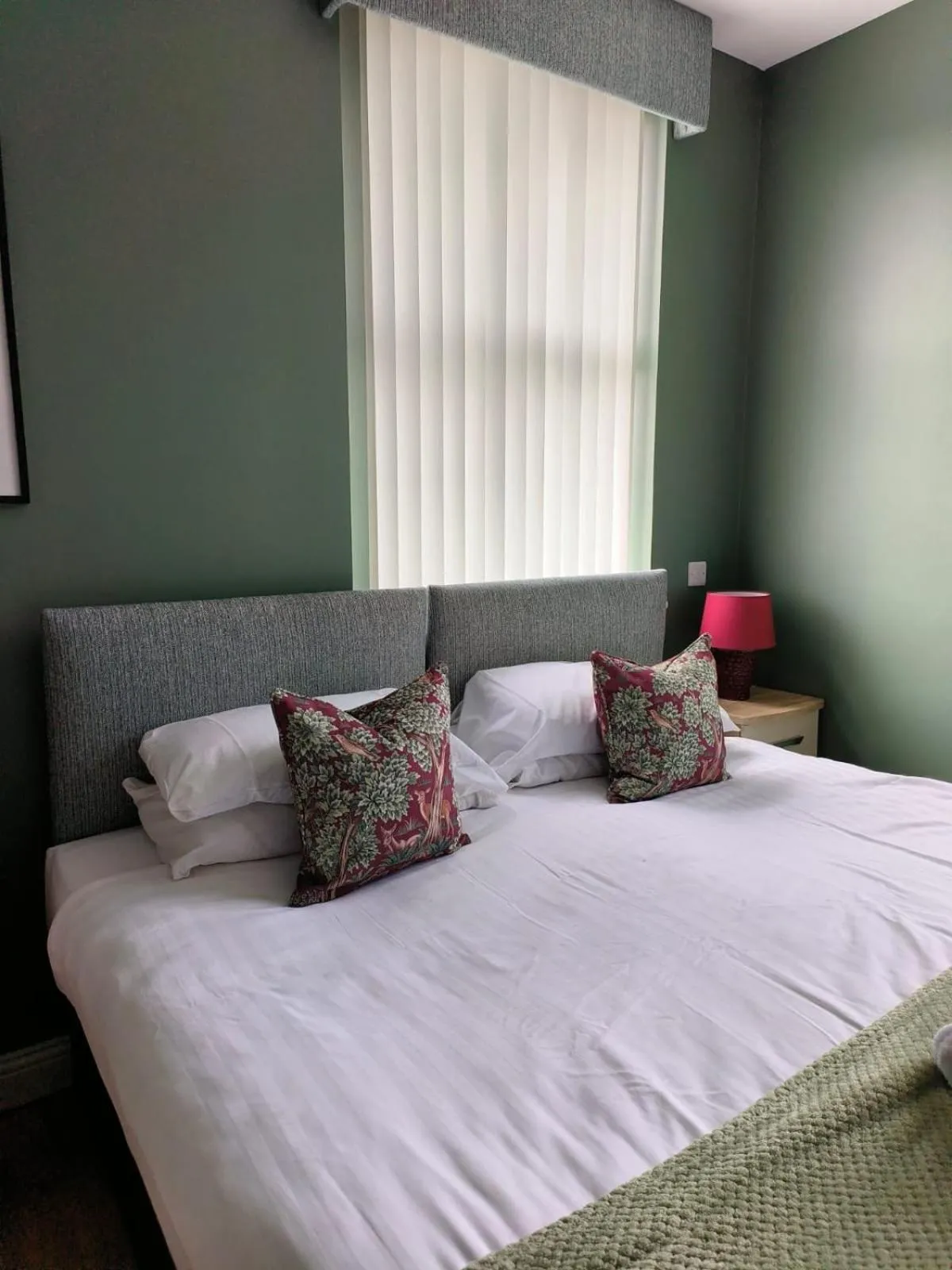 Bed in Walsh's Mill Lodges & Linen House