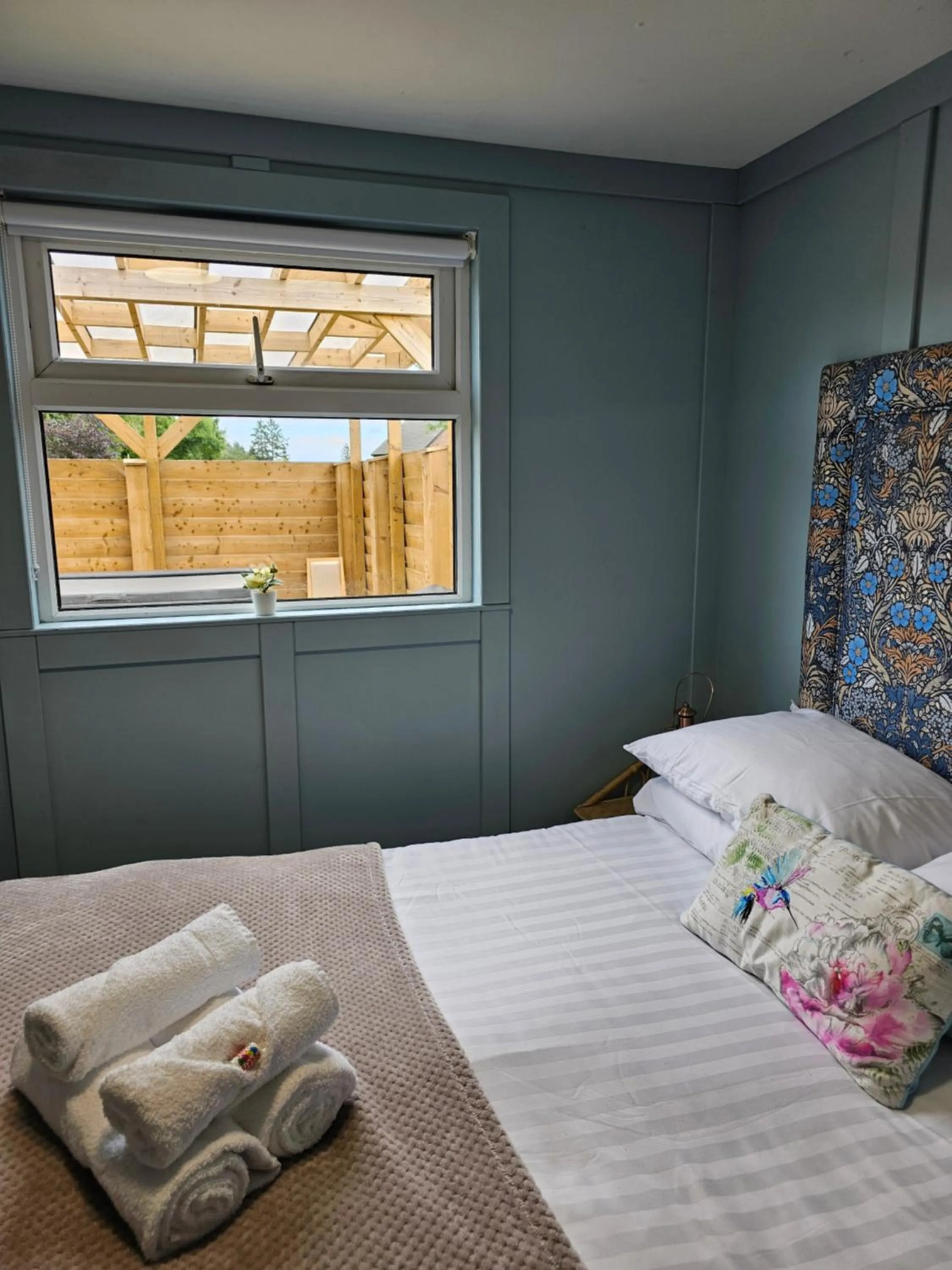 Bed in Walsh's Mill Lodges & Linen House