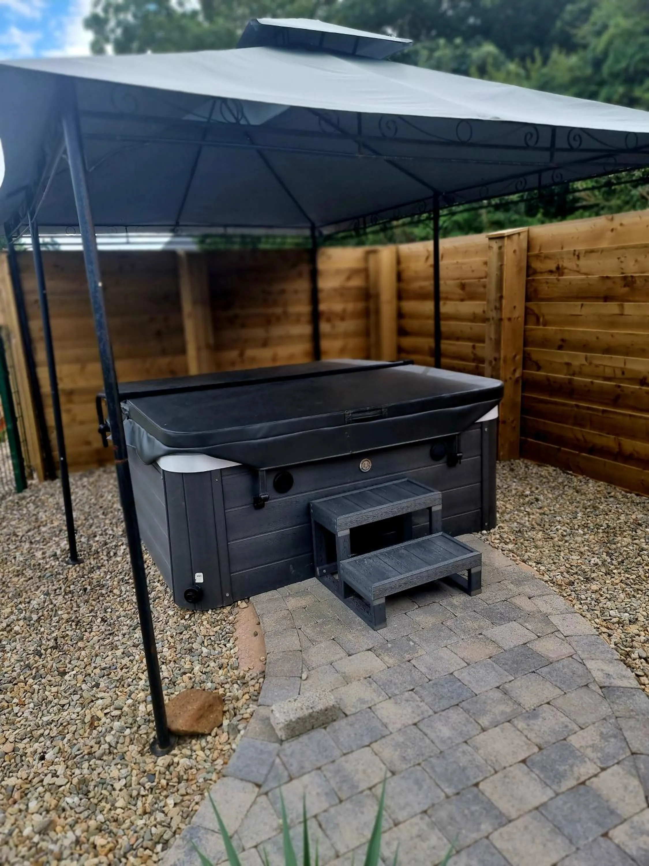 Hot Tub in Walsh's Mill Lodges & Linen House