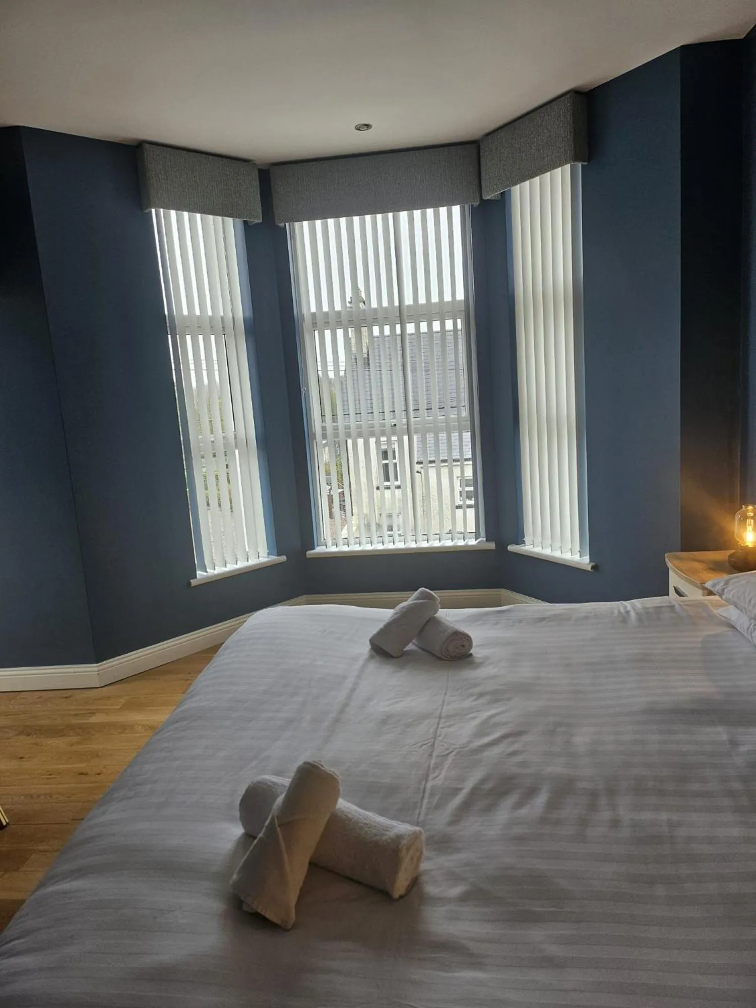 Bed in Walsh's Mill Lodges & Linen House