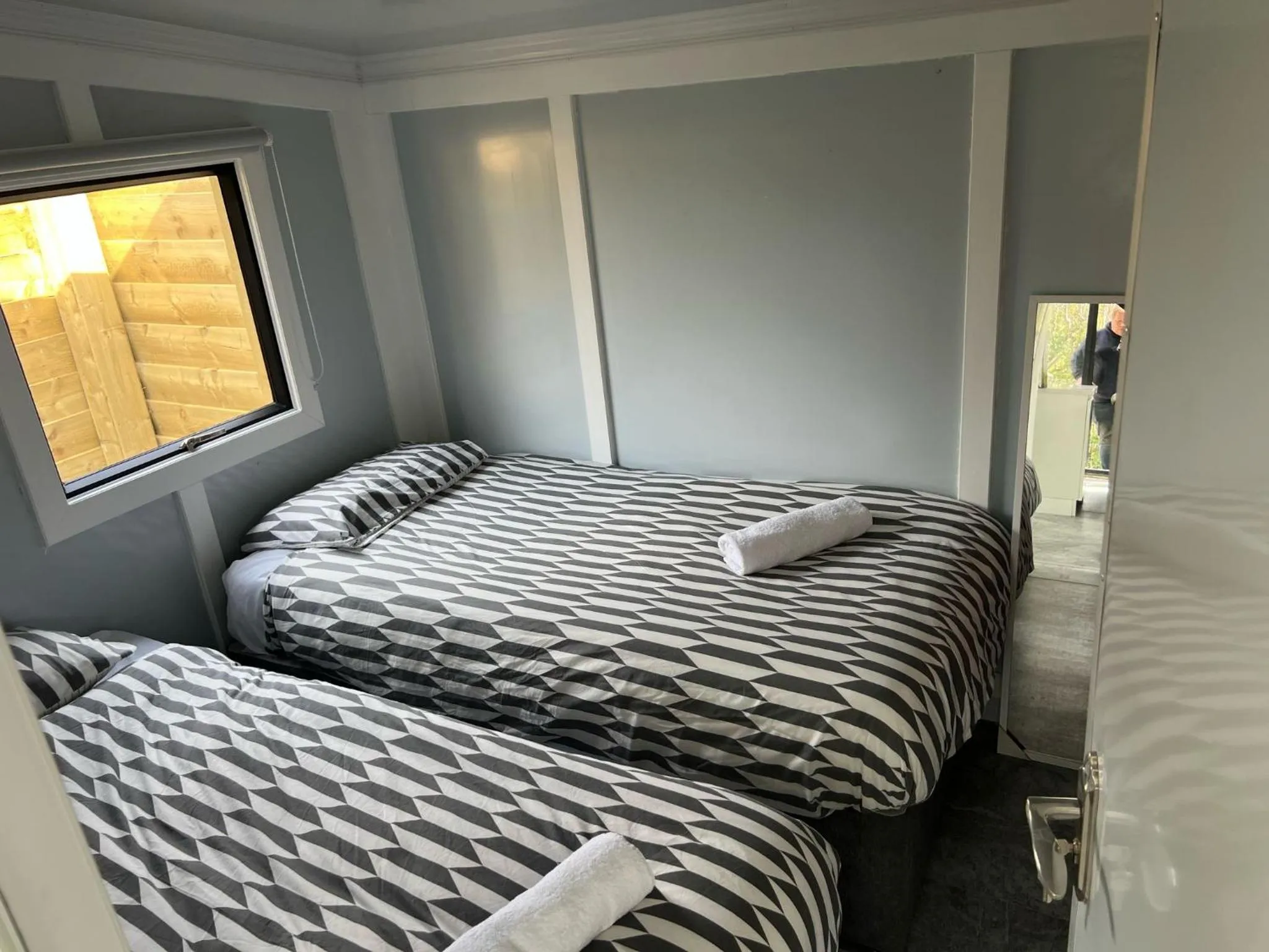 Bed in Walsh's Mill Lodges & Linen House