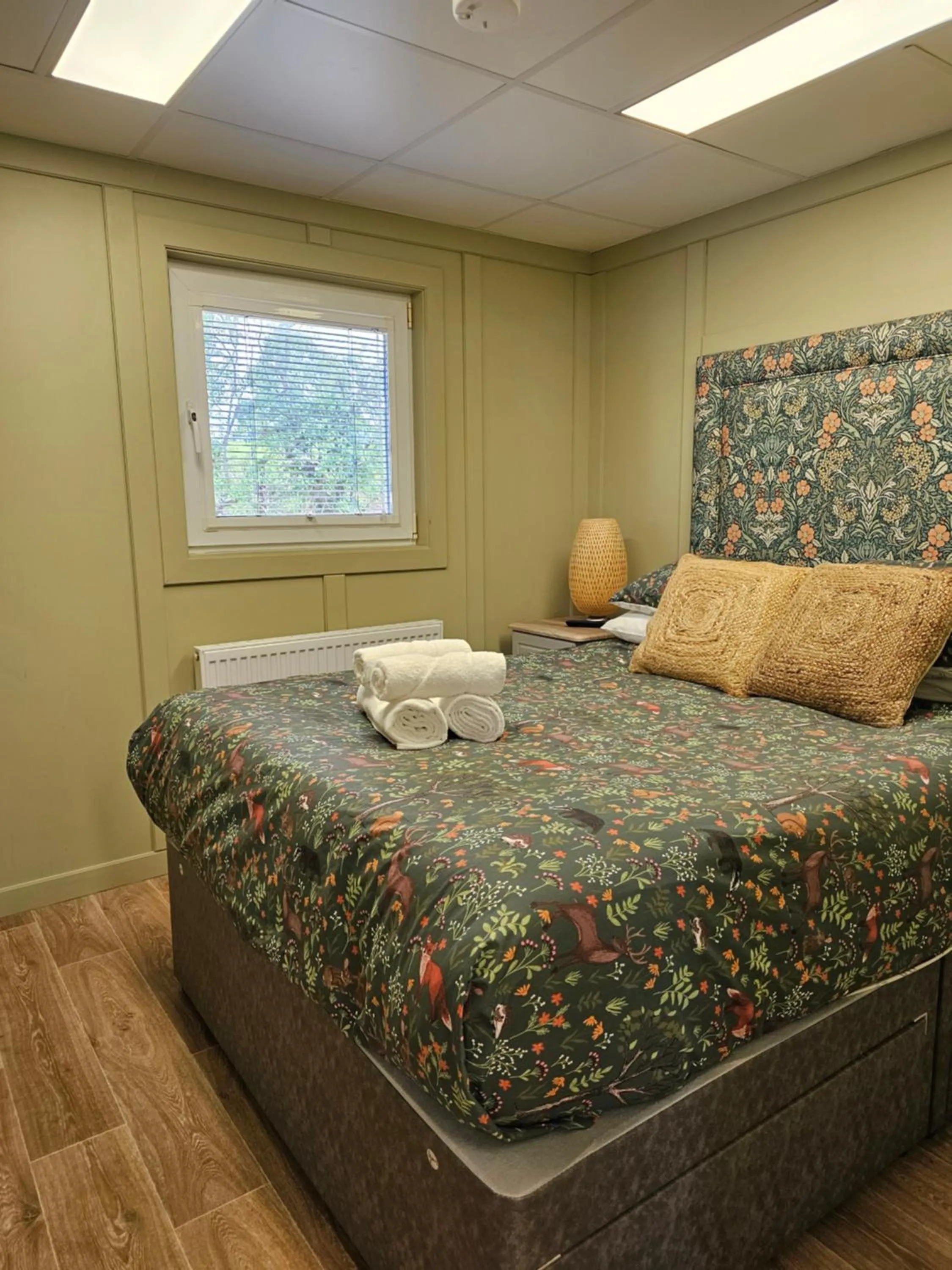 Bed in Walsh's Mill Lodges & Linen House