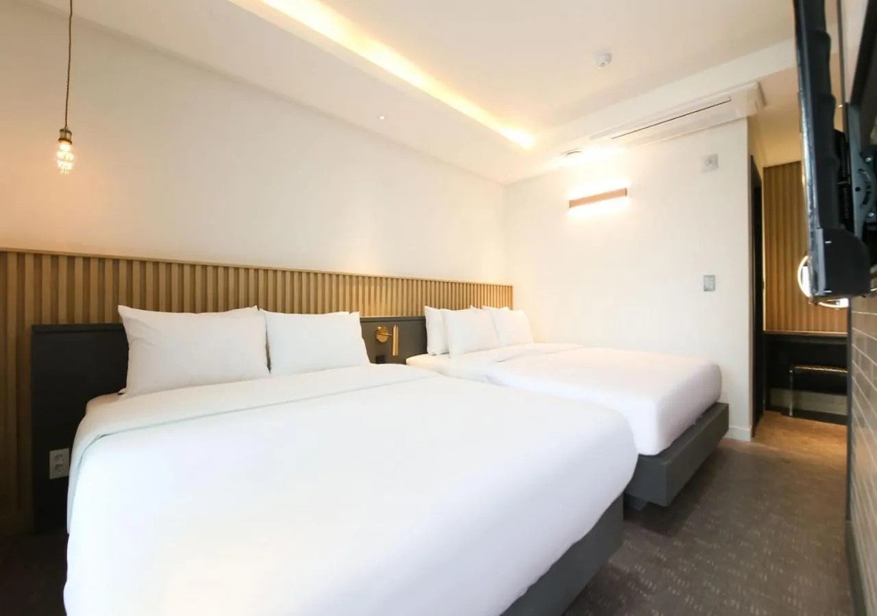 Bed in West In Hotel Yeosu