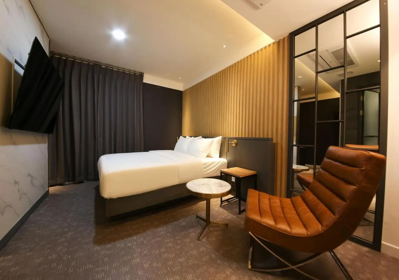 Photo of the whole room, Bed in West In Hotel Yeosu